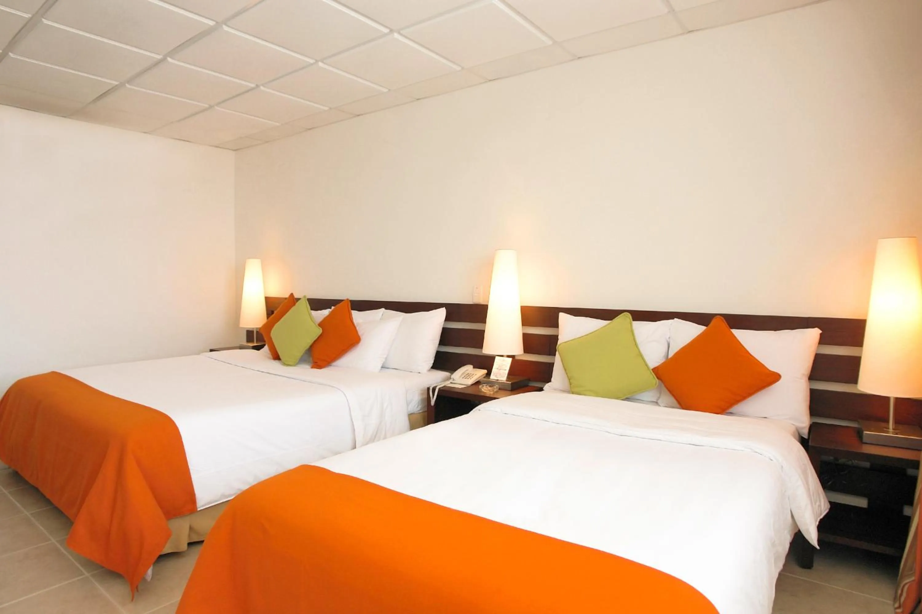 Bed in Decameron Los Delfines - All Inclusive