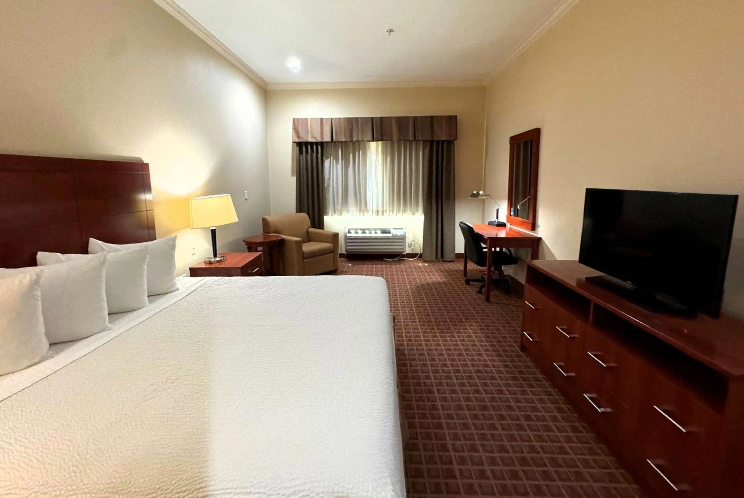 Photo of the whole room, Bed in Ramada by Wyndham College Station