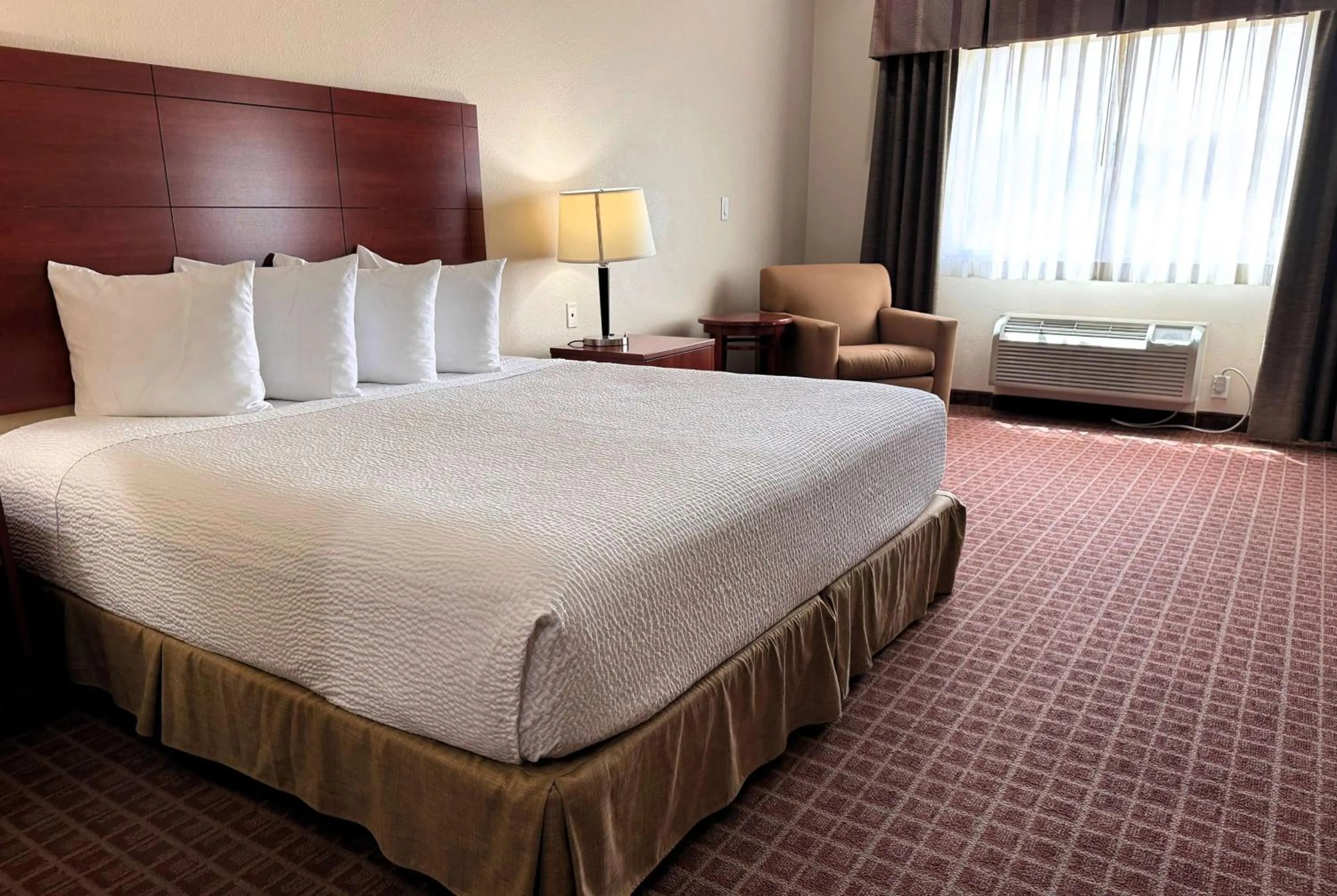 Photo of the whole room, Bed in Ramada by Wyndham College Station