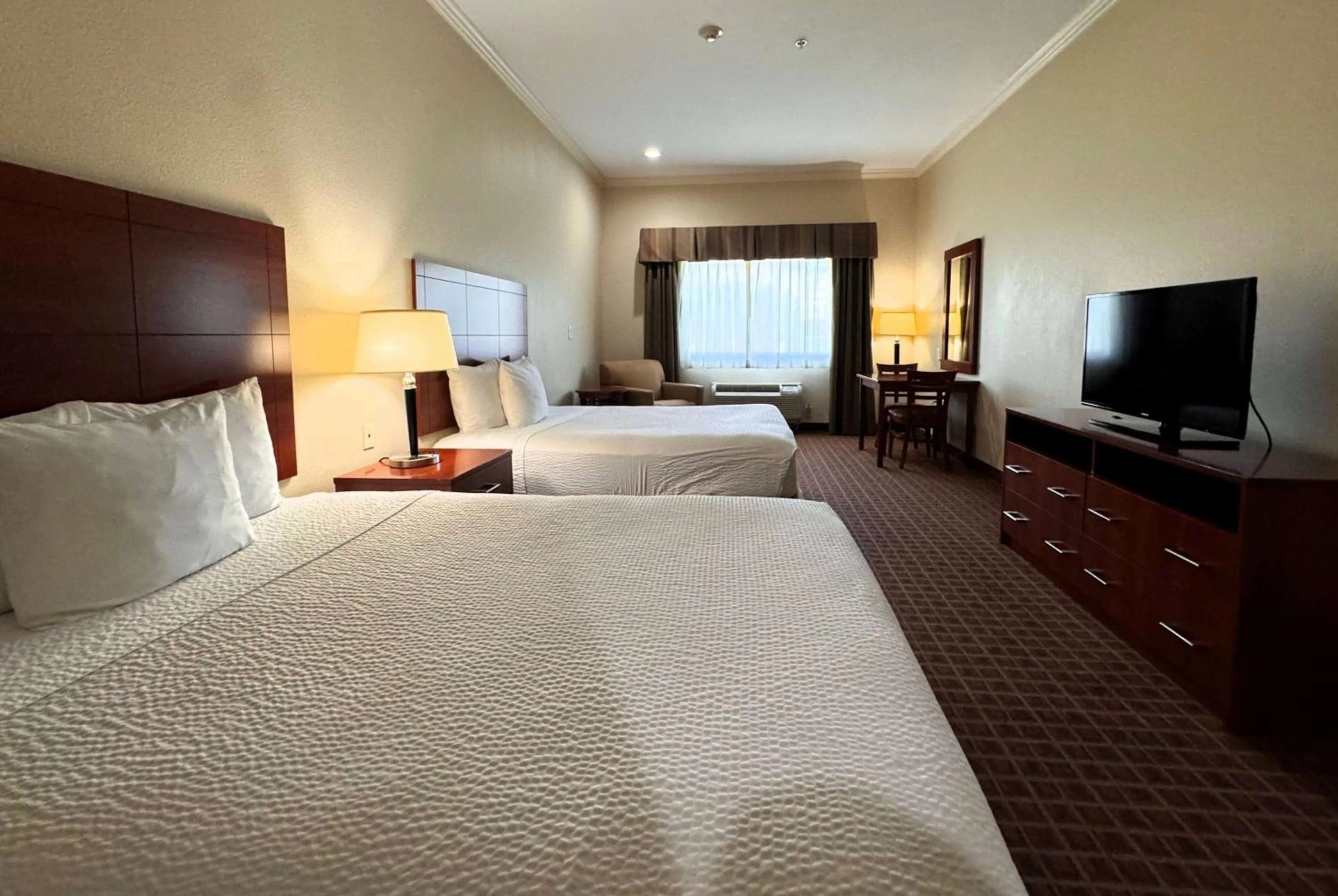 Photo of the whole room, Bed in Ramada by Wyndham College Station