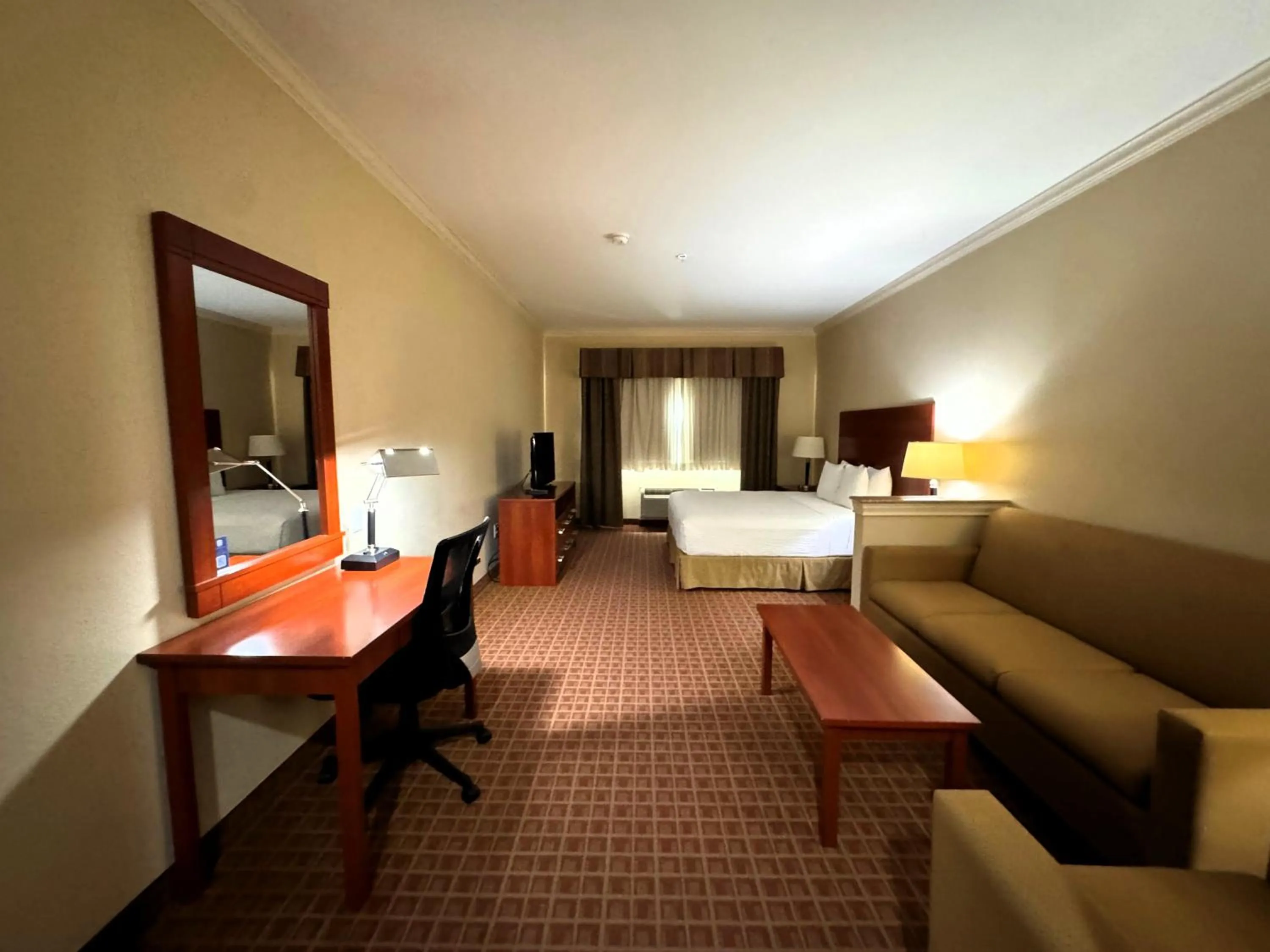 Photo of the whole room, Bed in Ramada by Wyndham College Station