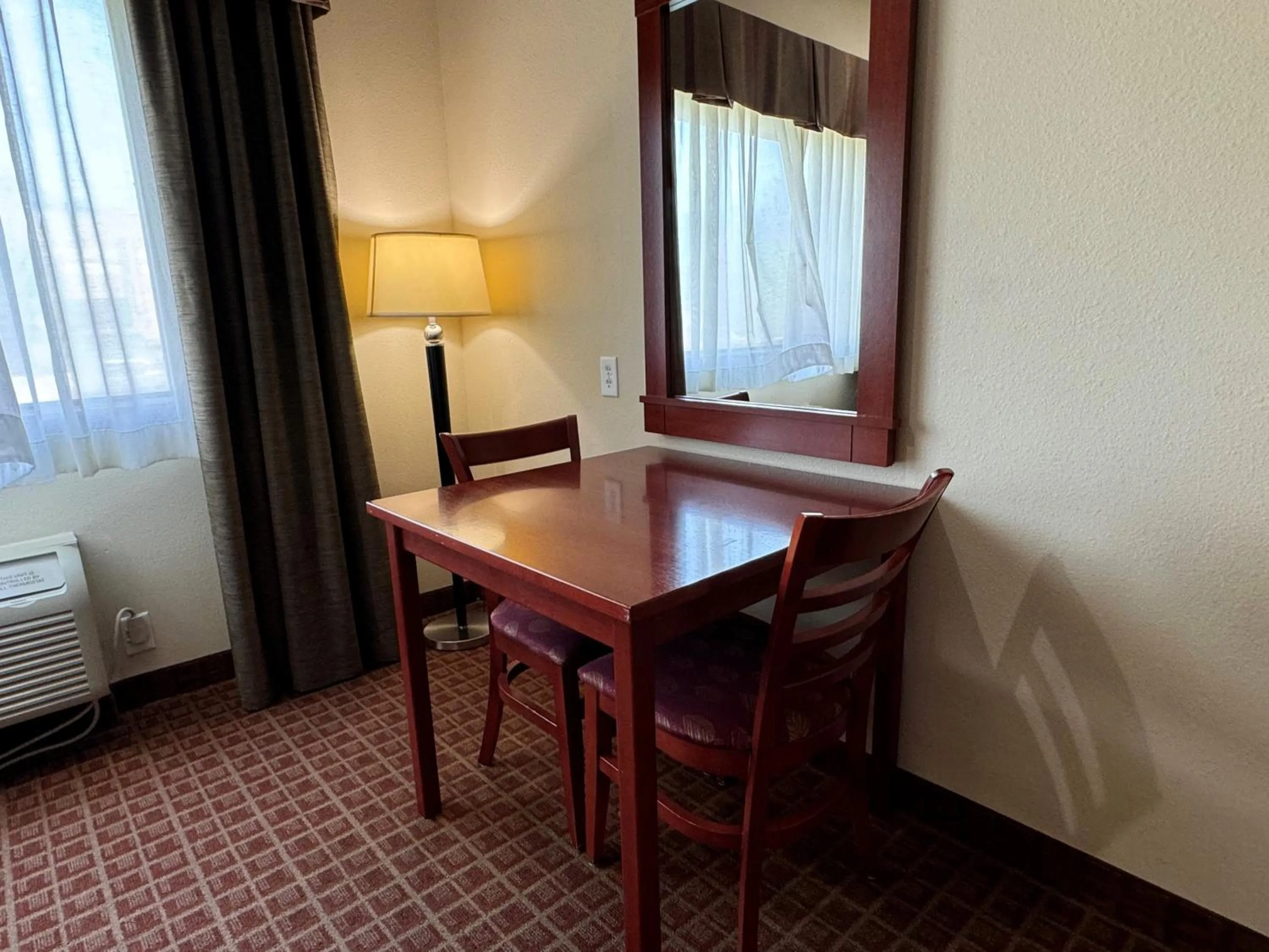 Seating area in Ramada by Wyndham College Station