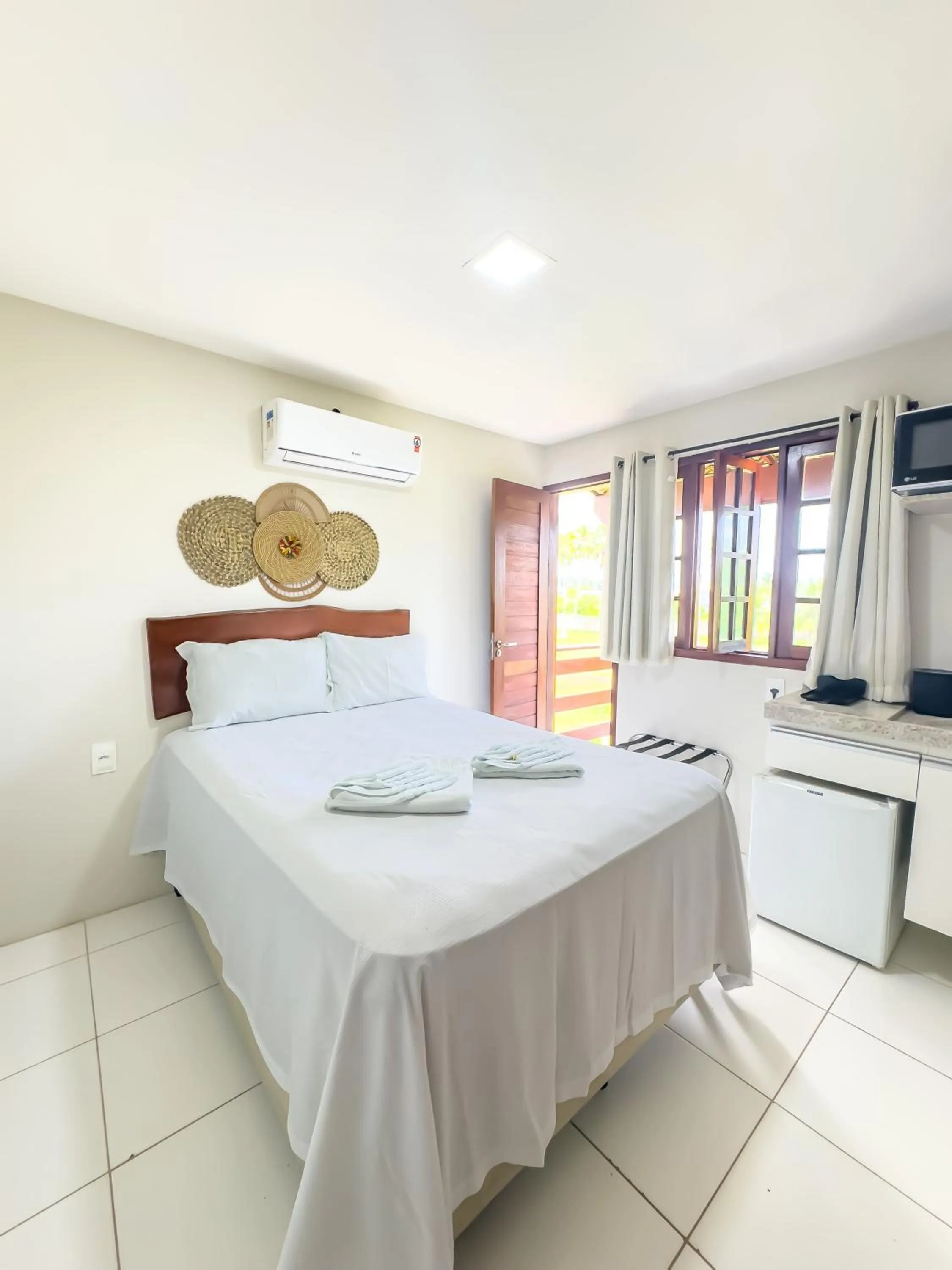 Kitchen or kitchenette, Bed in Chales Maragogi