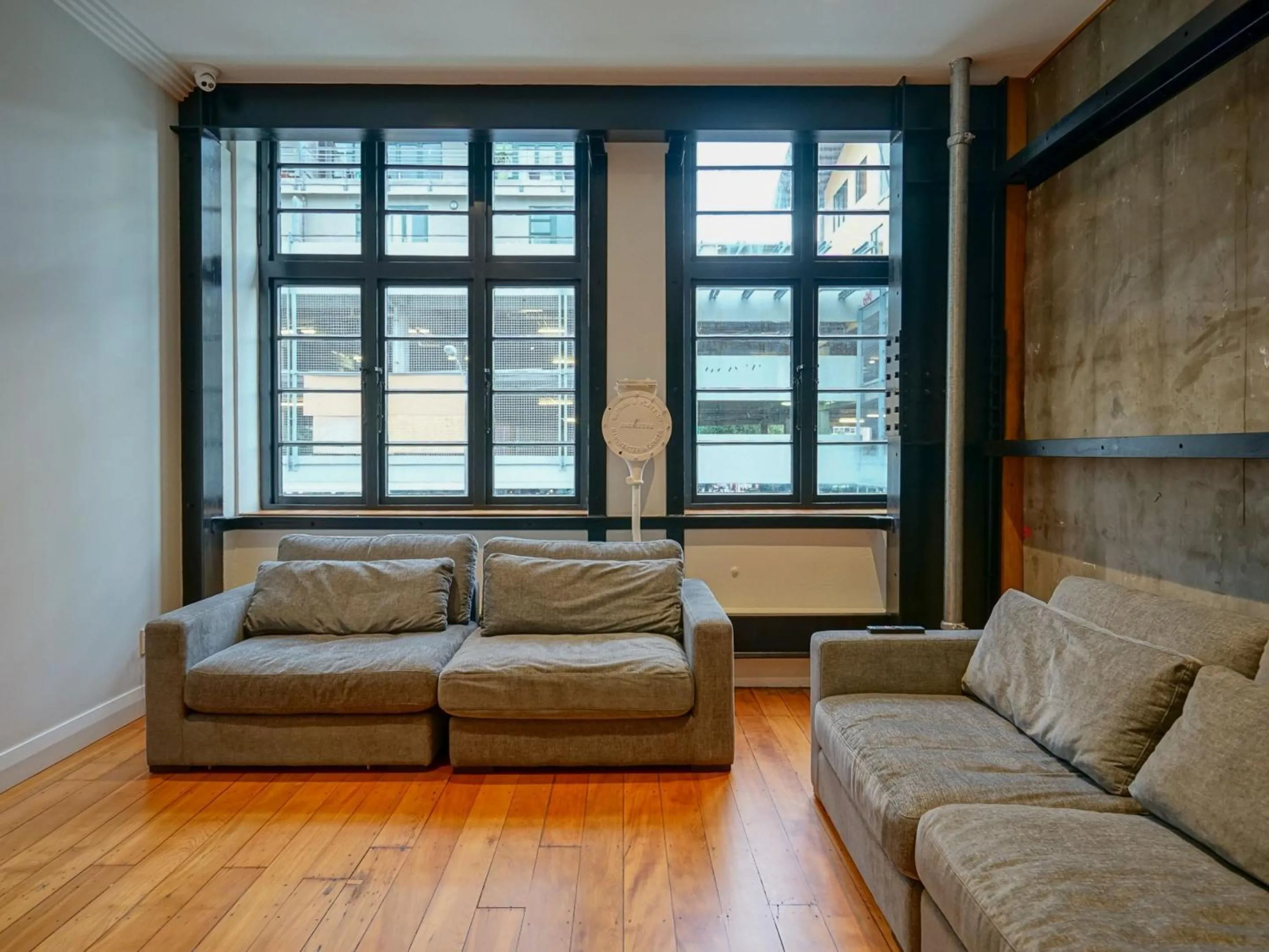 Communal lounge/ TV room in The Marion Hostel