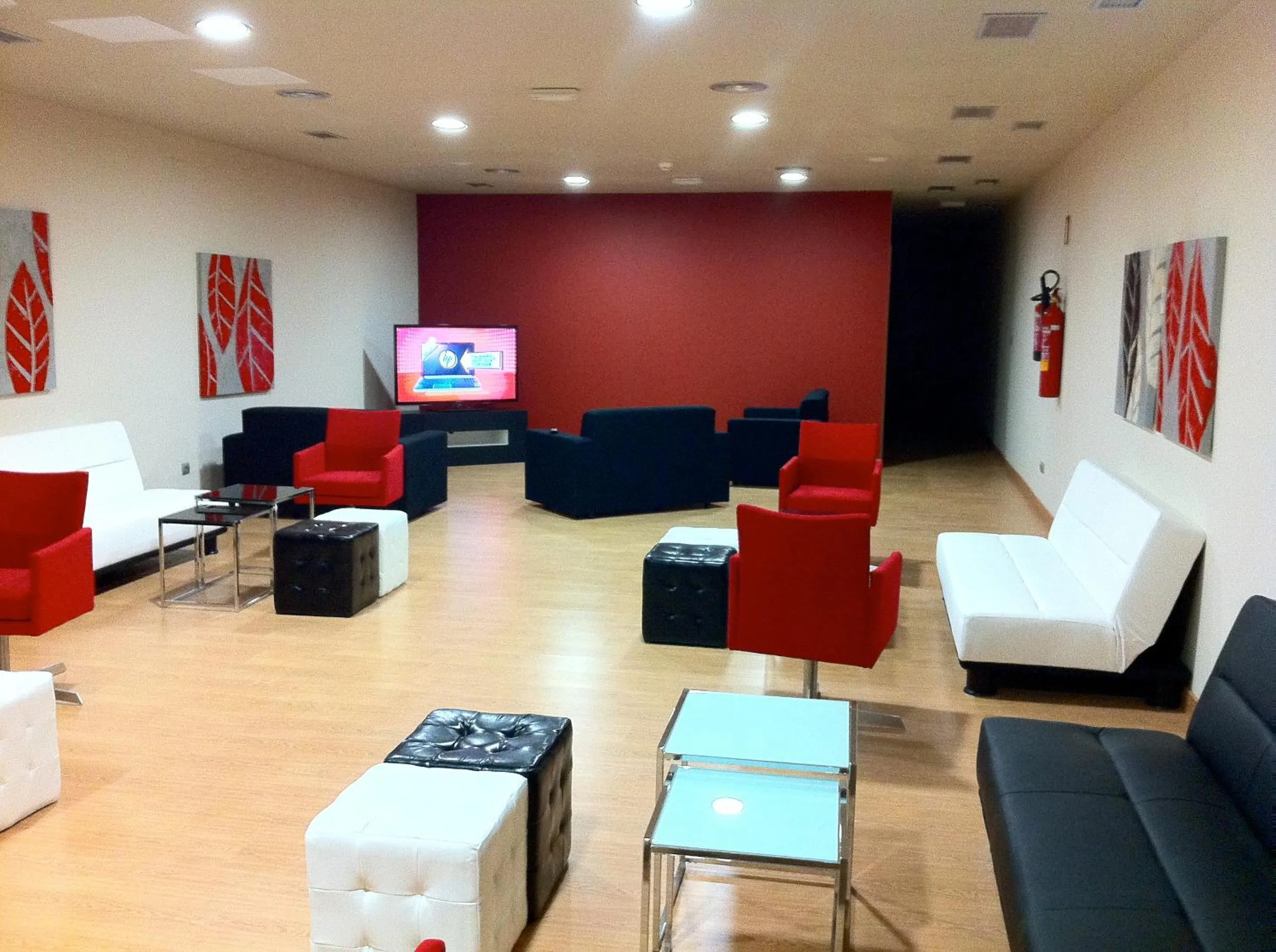 Communal lounge/ TV room in Aparthotel Bubal