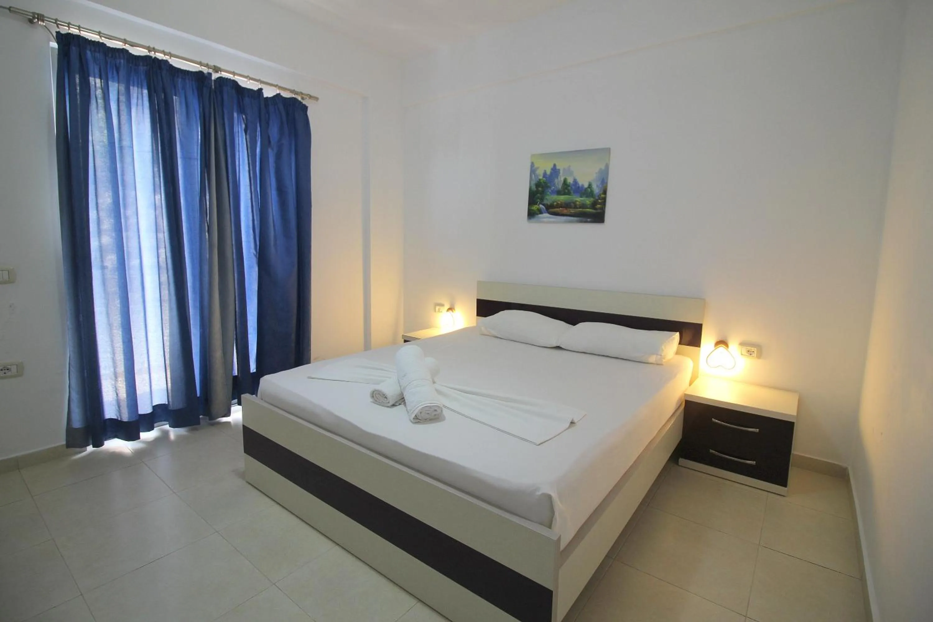 Bed in Hotel Argjiro