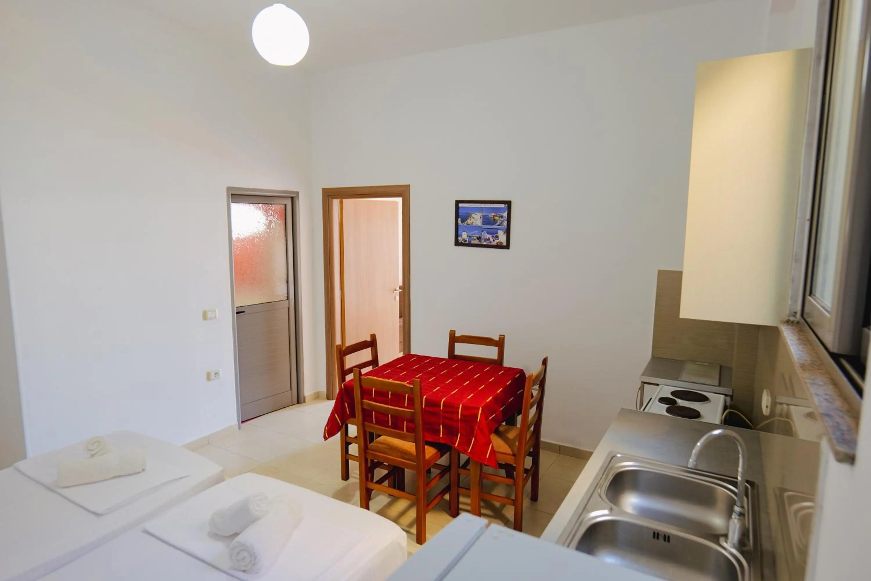 Bed in Hotel Argjiro