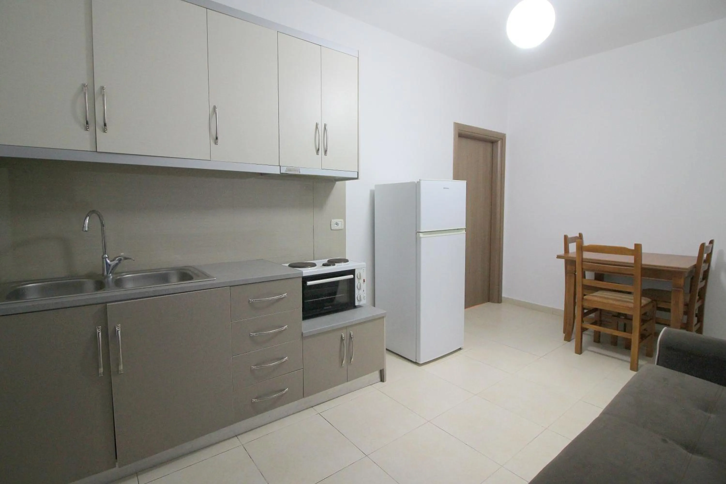 Kitchen or kitchenette in Hotel Argjiro