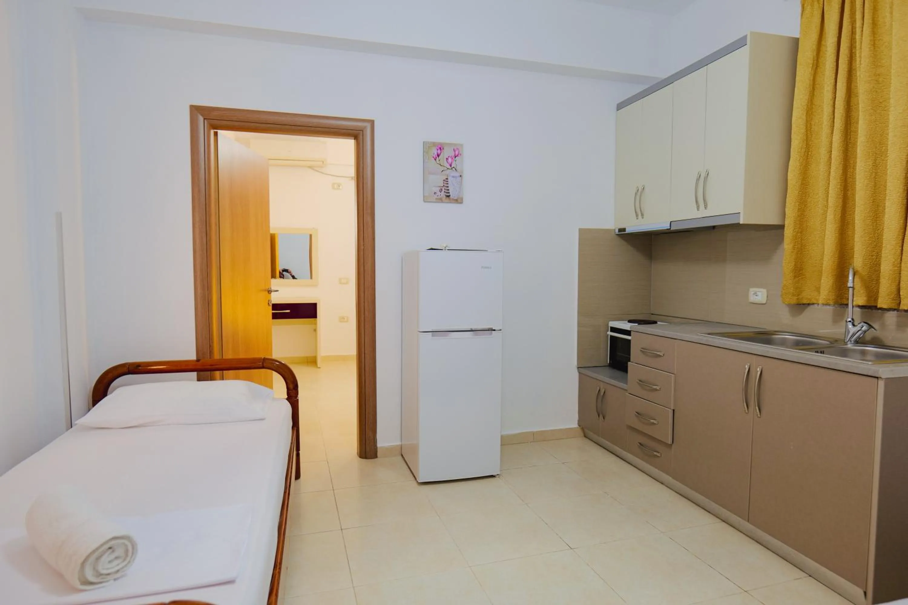 Bed in Hotel Argjiro