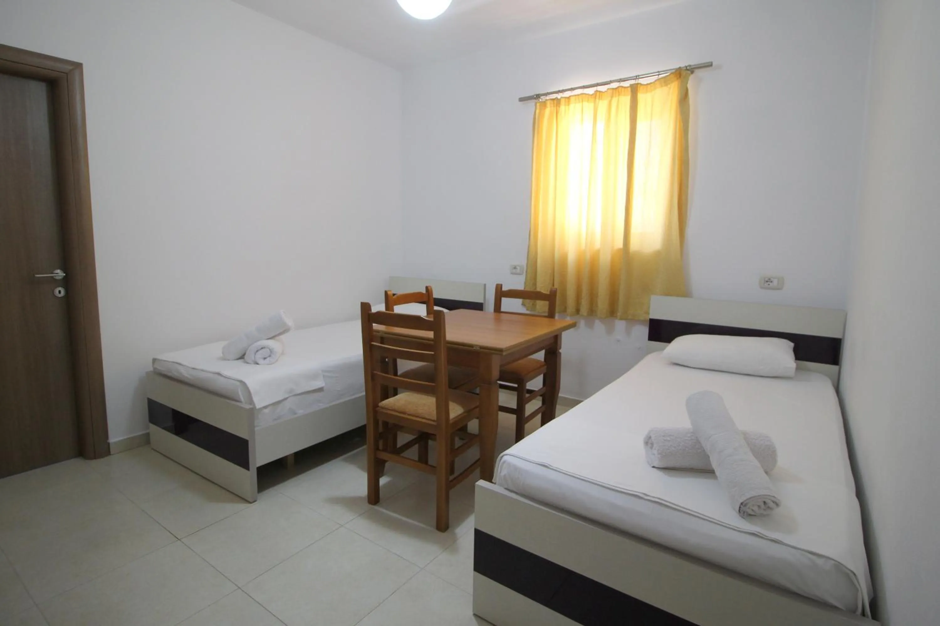 Bed in Hotel Argjiro