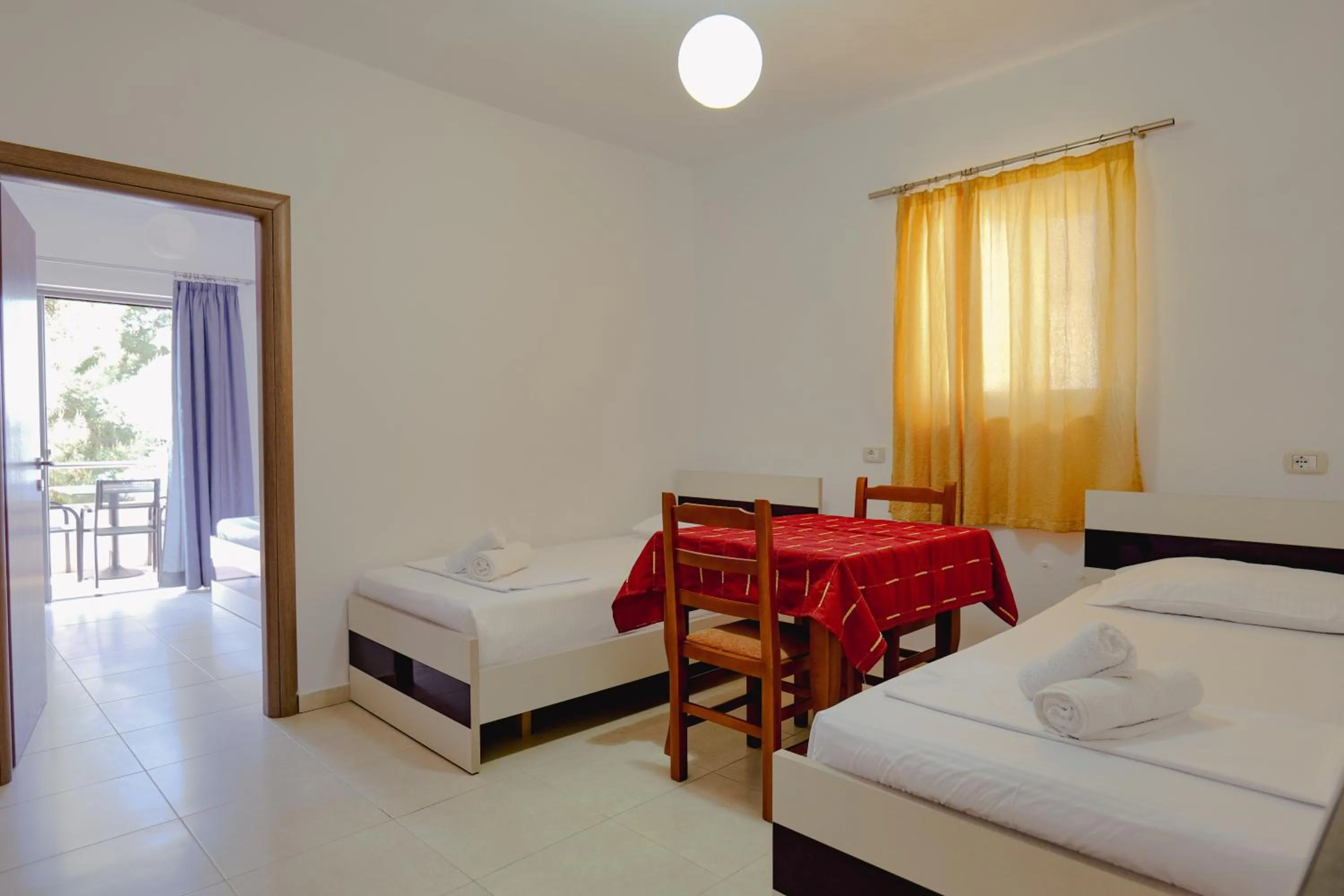 Bed in Hotel Argjiro