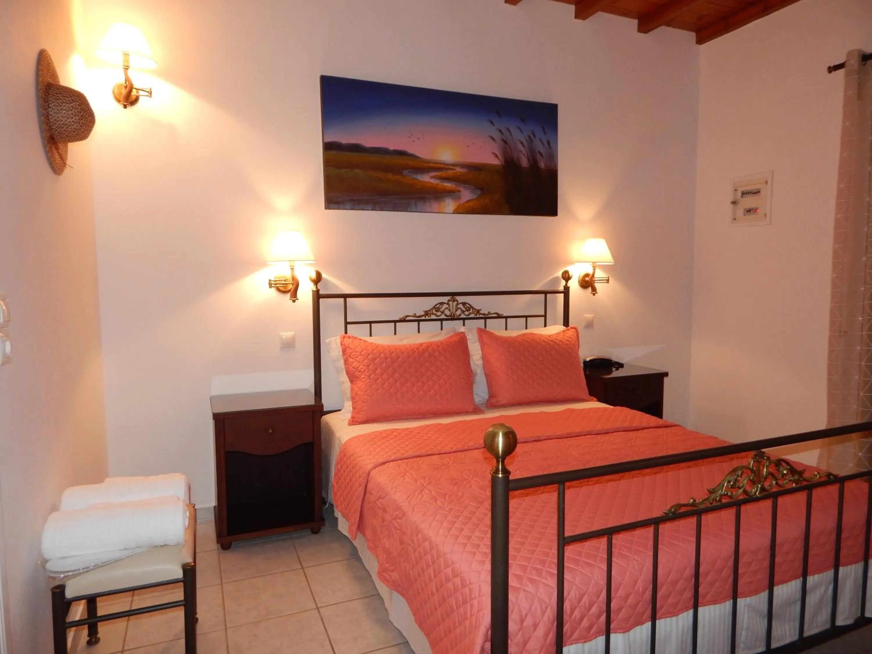 Bed in Tinos Suites & Apartments