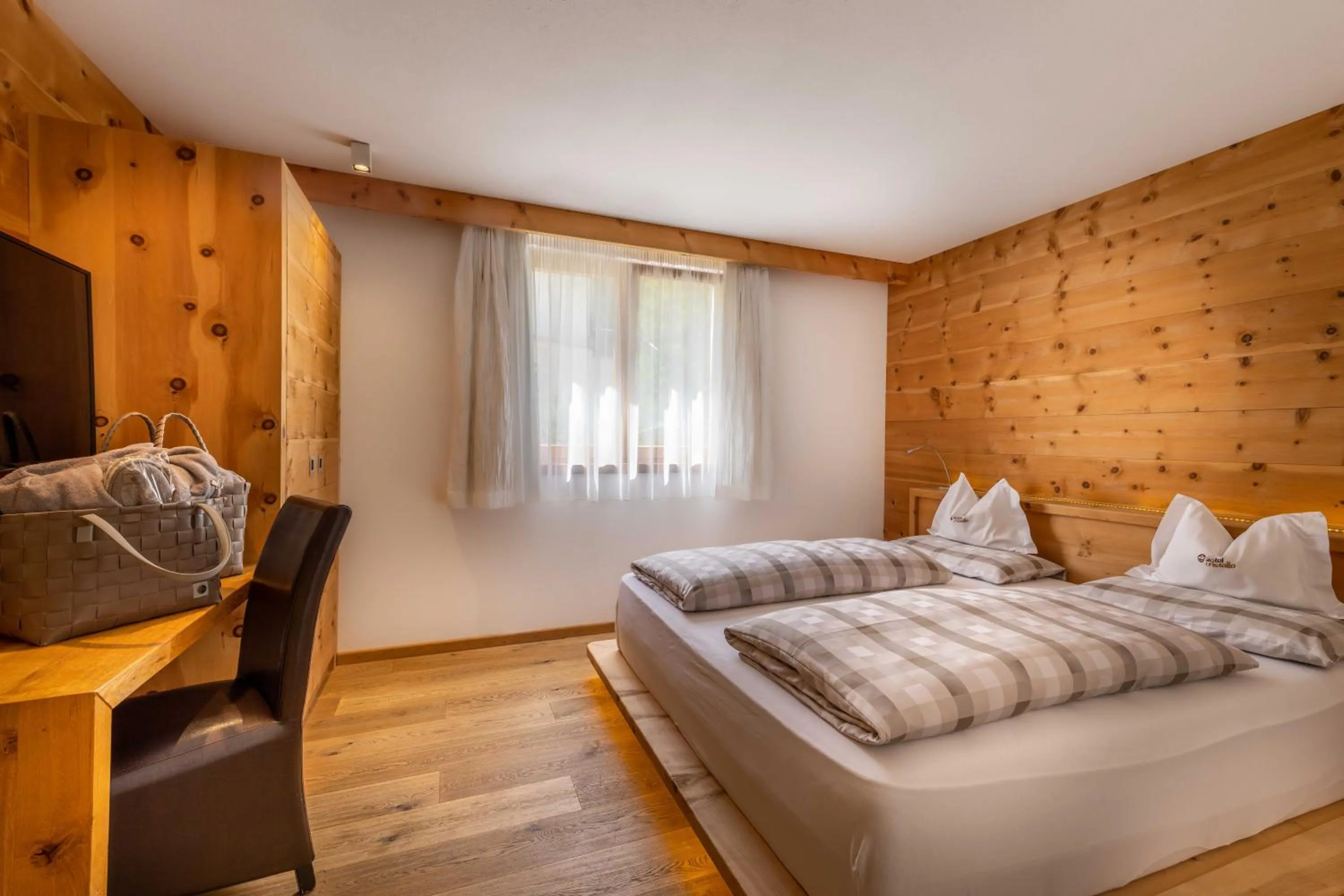 Bedroom, Bed in Hotel Cristallo - Wellness Mountain Living