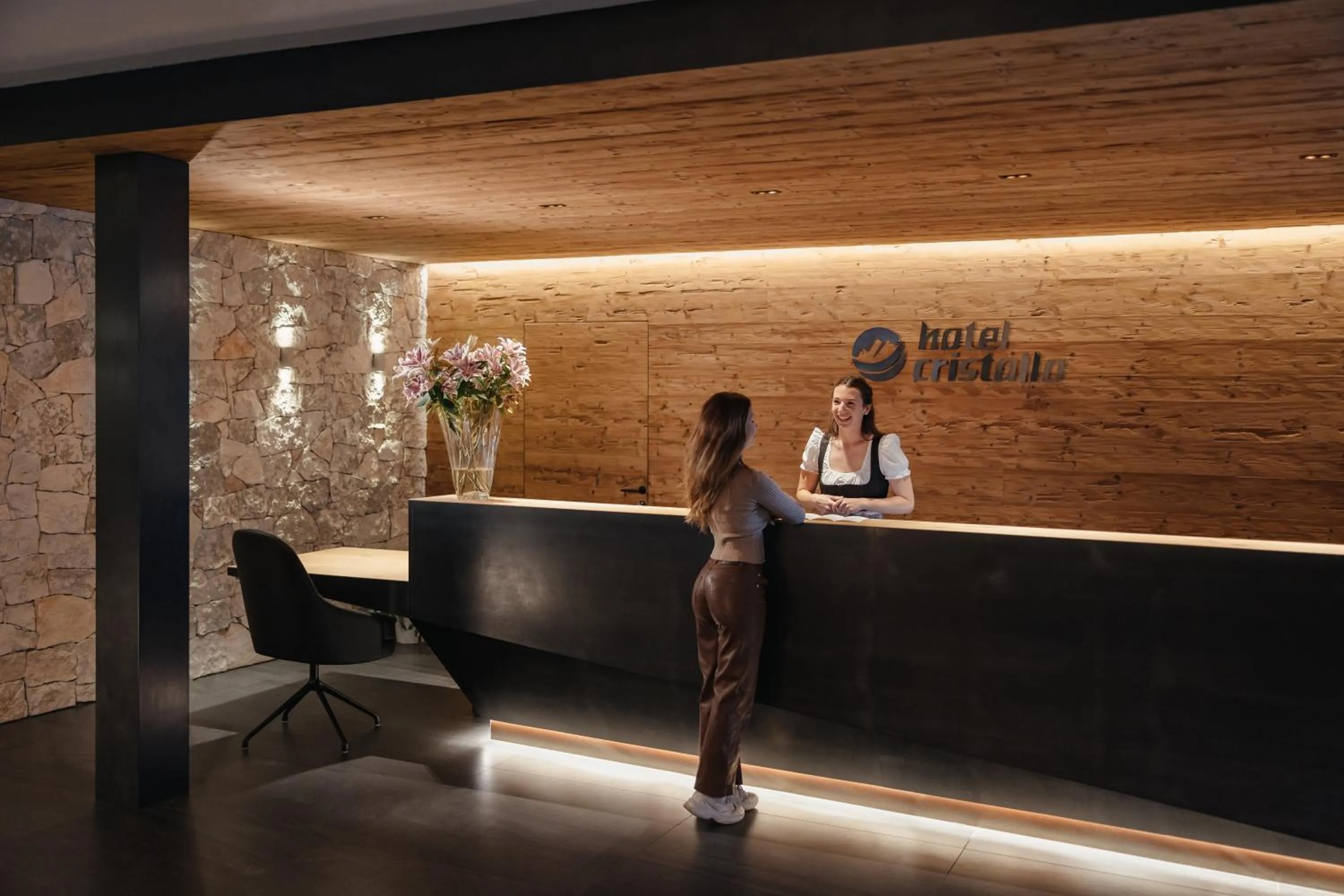 Text overlay in Hotel Cristallo - Wellness Mountain Living