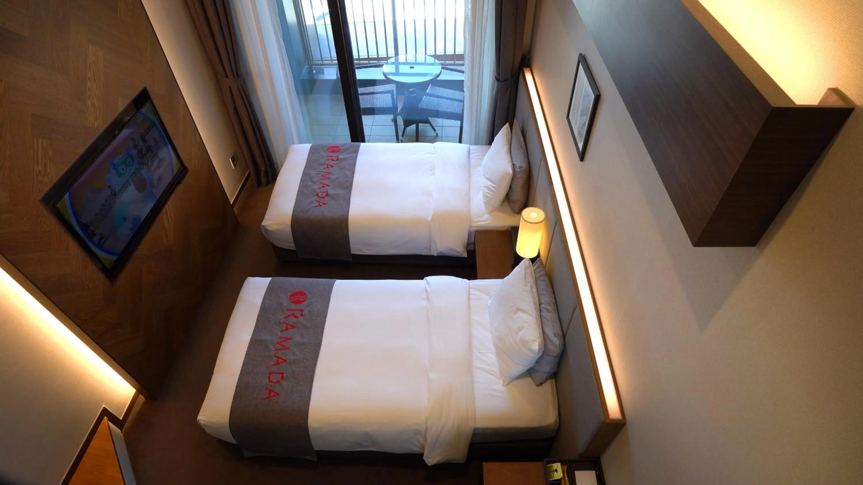 Photo of the whole room, Bed in Ramada Hotel & Suite by Wyndham Gangwon Pyeongchang
