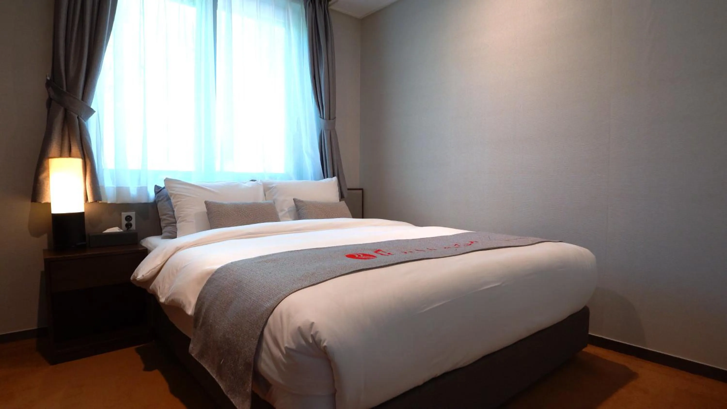 Photo of the whole room, Bed in Ramada Hotel & Suite by Wyndham Gangwon Pyeongchang