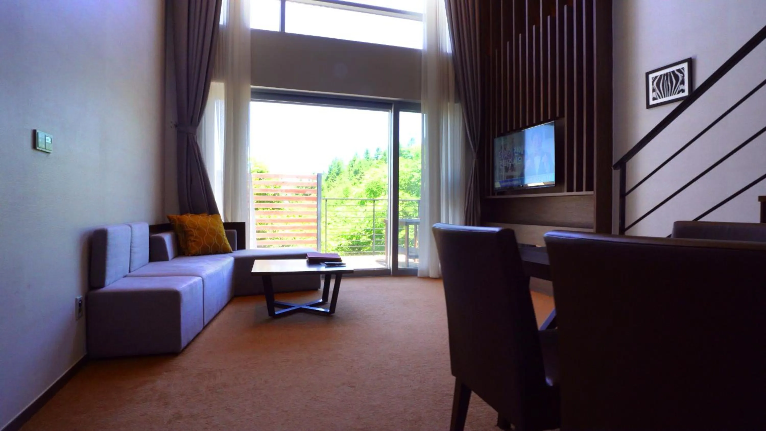 Living room in Ramada Hotel & Suite by Wyndham Gangwon Pyeongchang