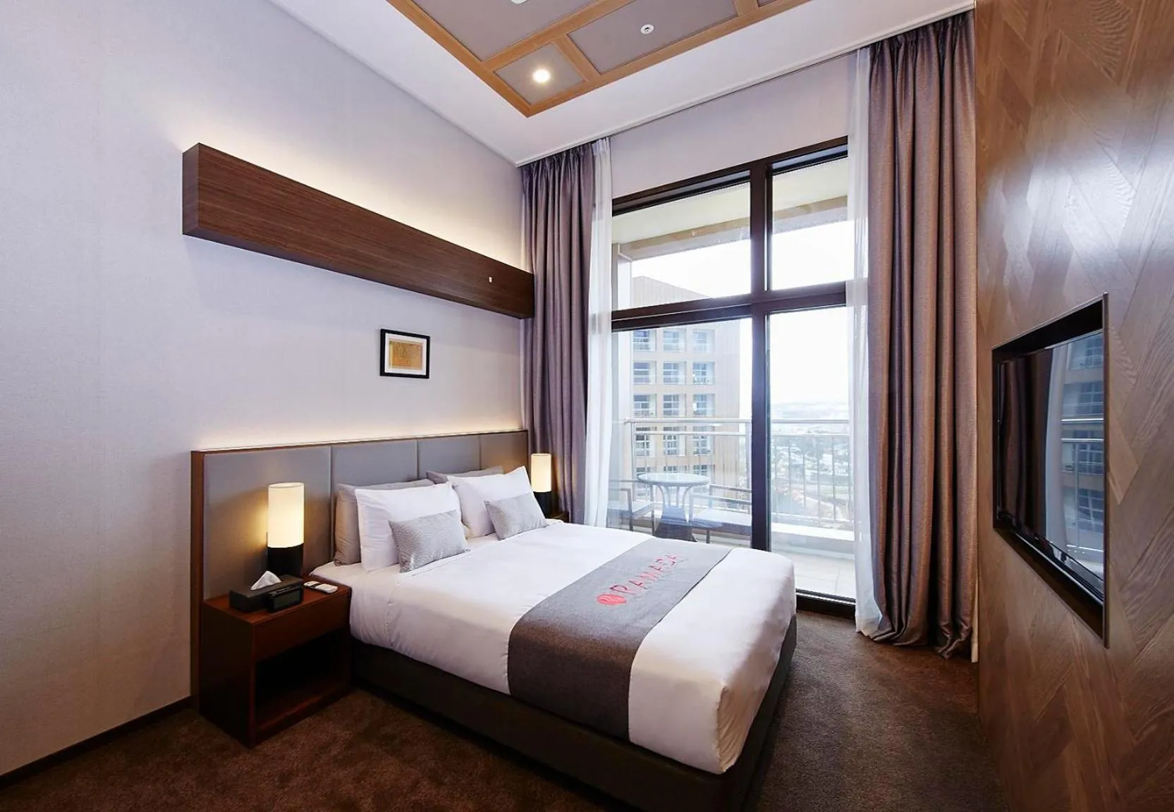 Photo of the whole room, Bed in Ramada Hotel & Suite by Wyndham Gangwon Pyeongchang