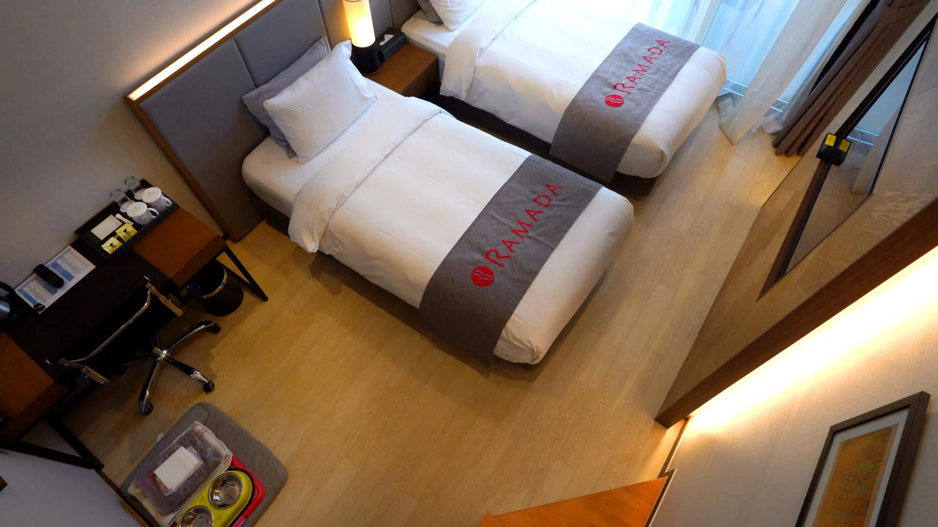 Bed in Ramada Hotel & Suite by Wyndham Gangwon Pyeongchang