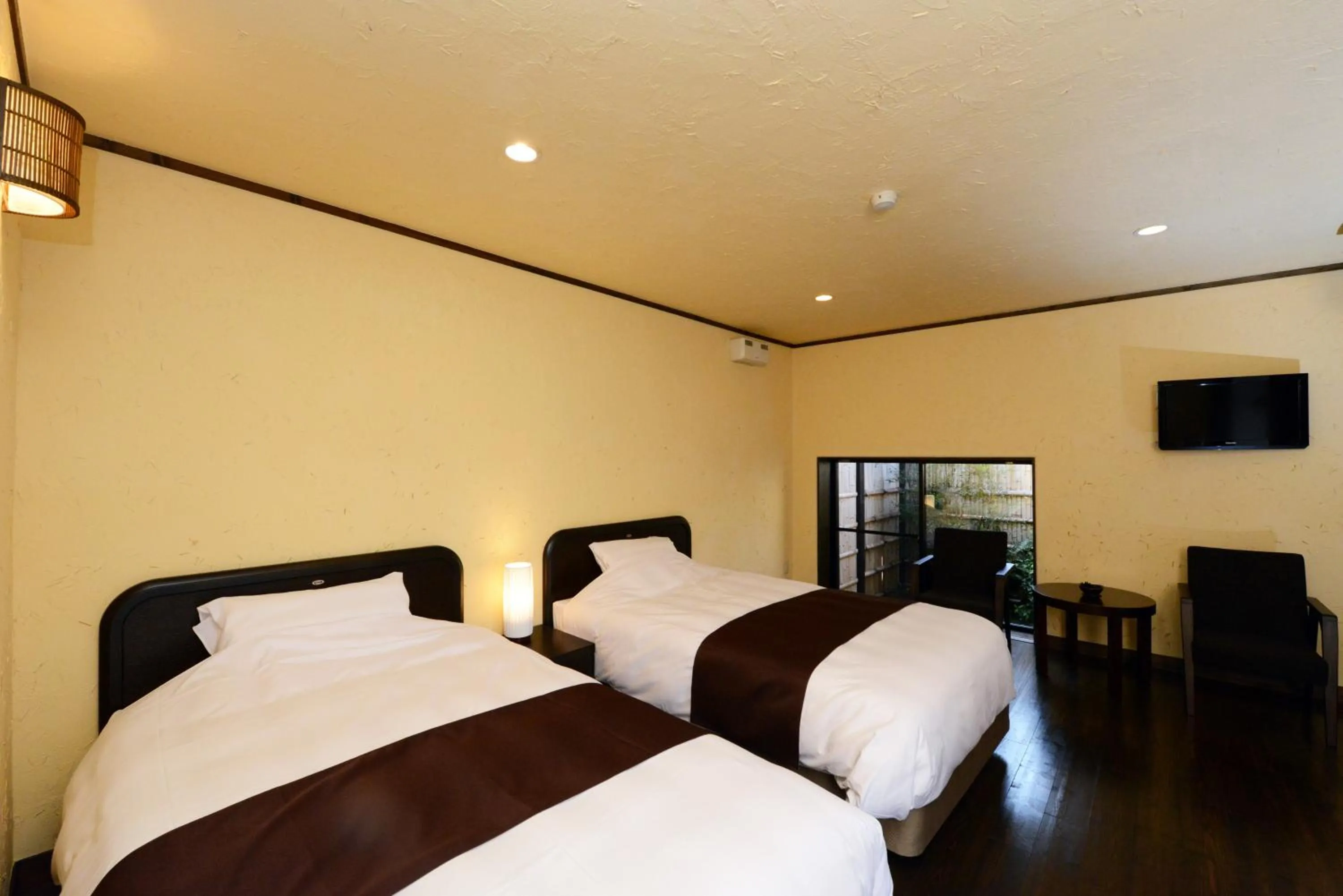 Bed in Ito Yukitei Kawana Bettei