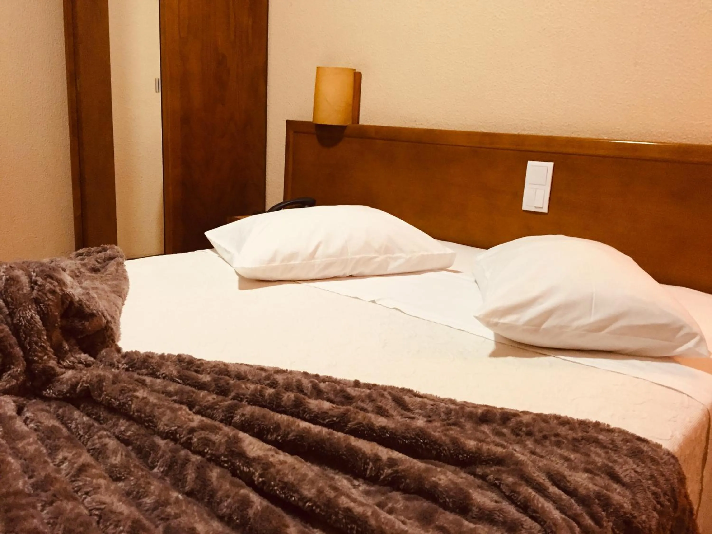 Bed in Hotel Portinari