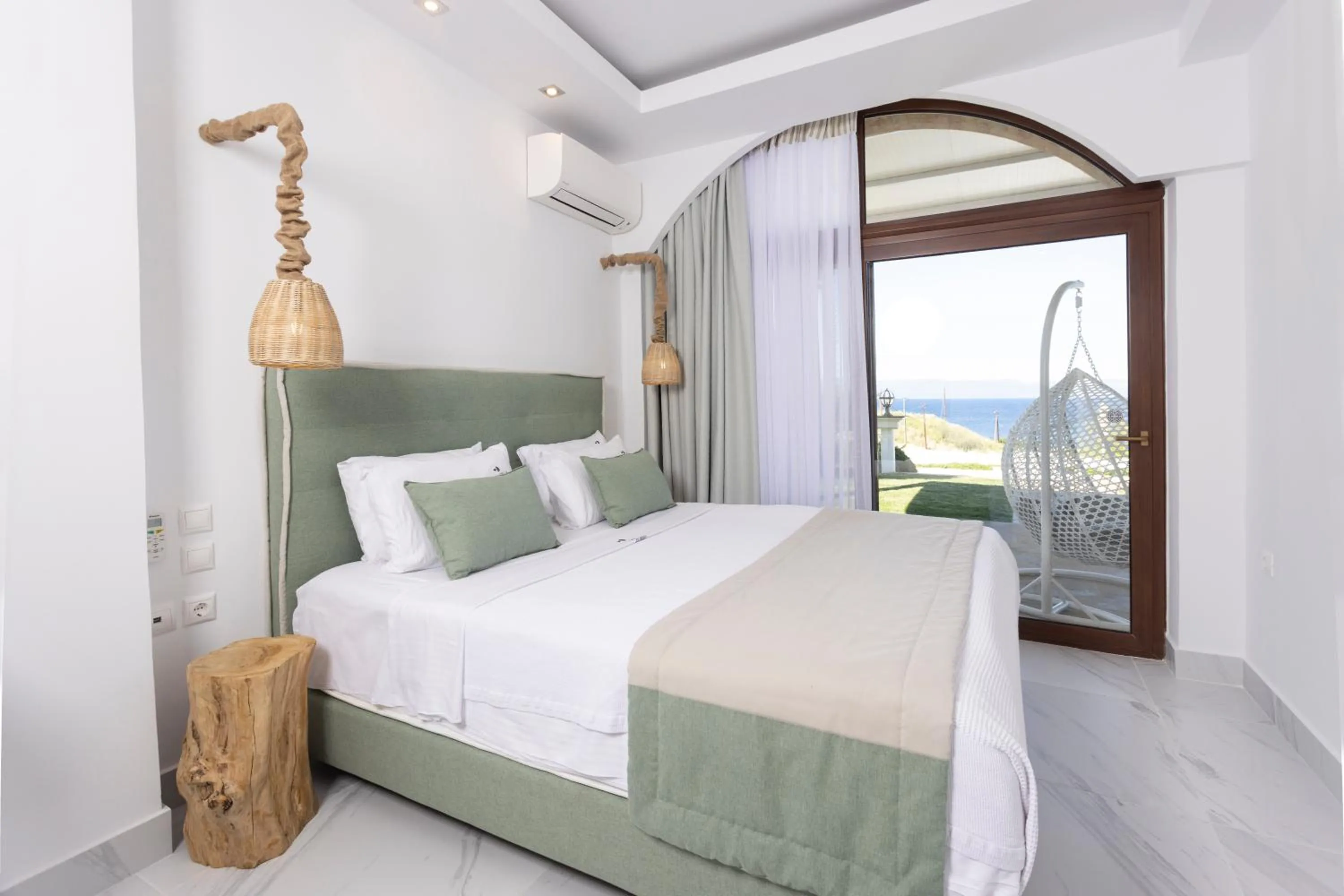 Bed in Villa D'Oro - Luxury Villas & Suites