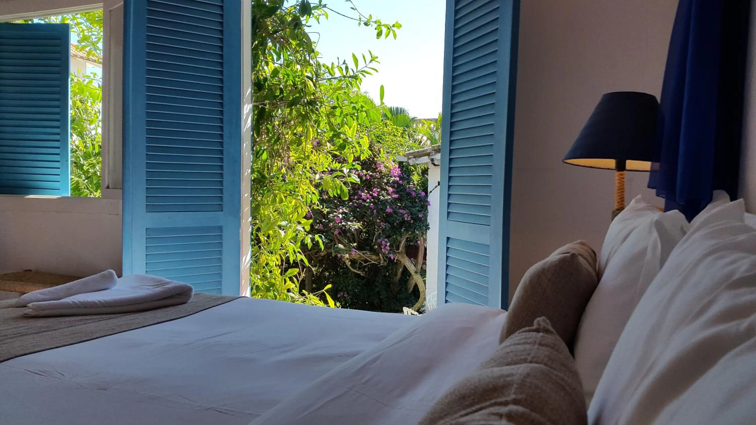 View (from property/room), Bed in Pousada Casa Búzios