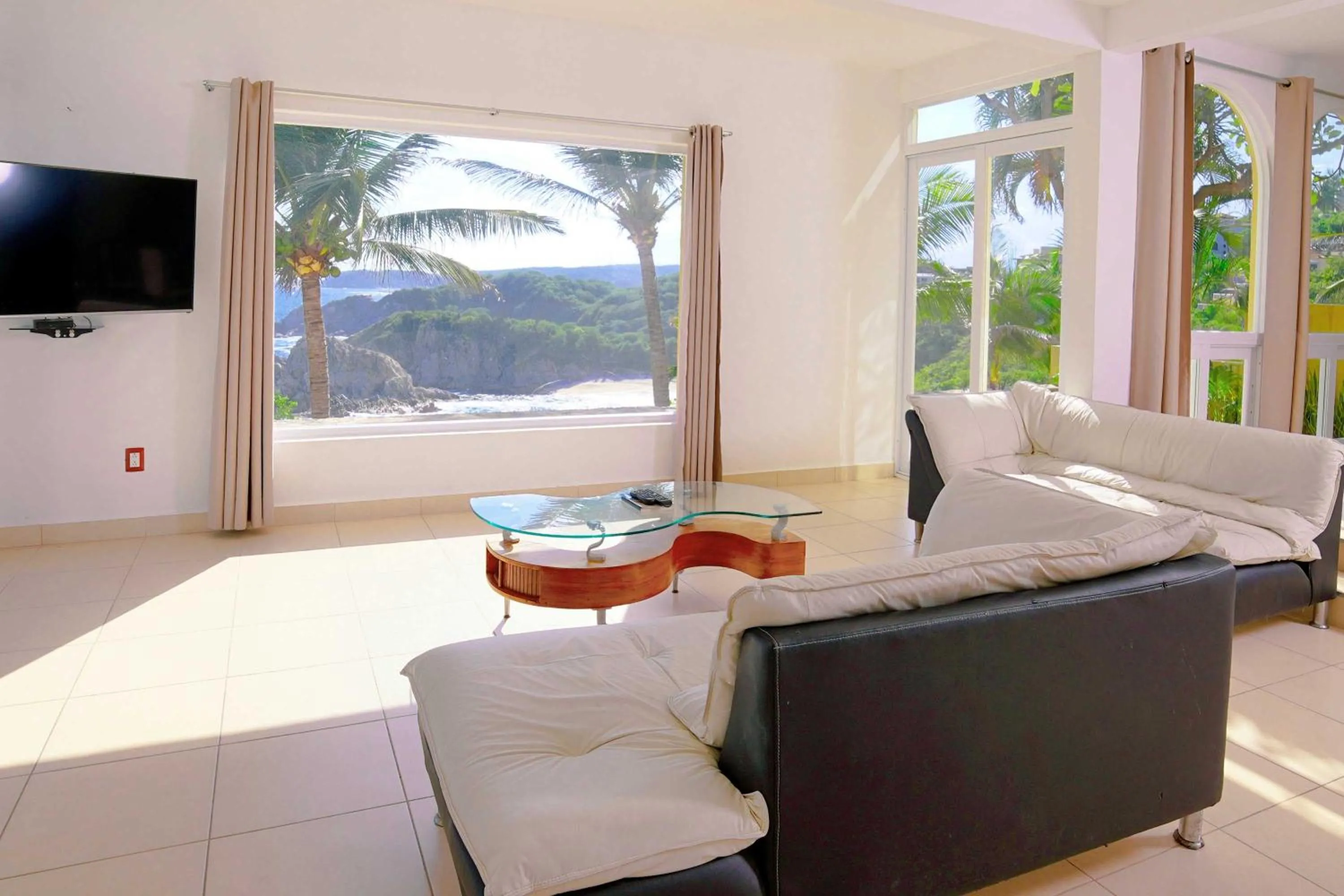 Living room, Bed in Villas & Resort Luz de Luna