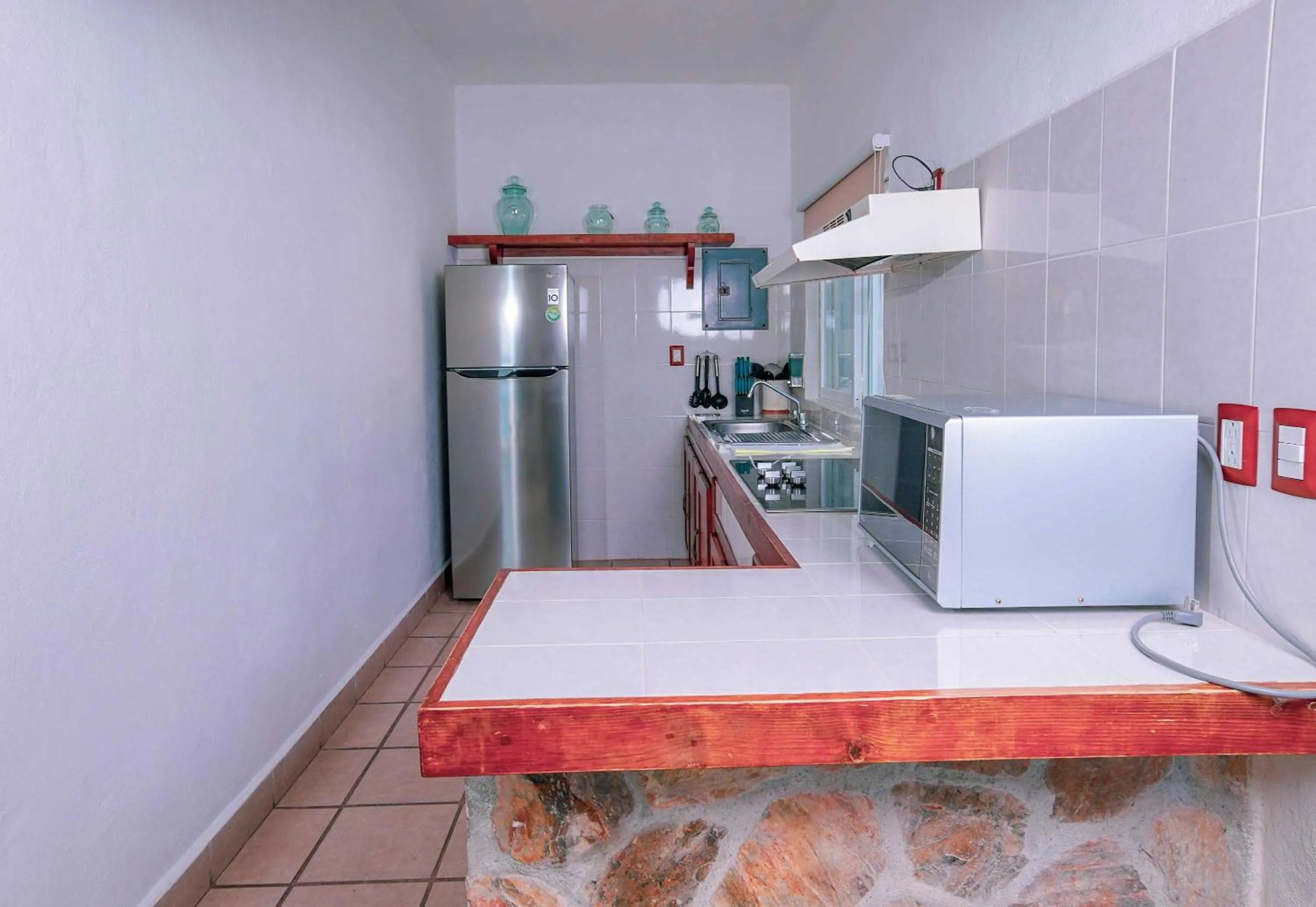 Kitchen or kitchenette in Villas & Resort Luz de Luna