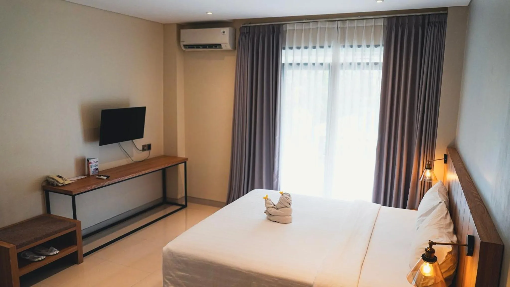Property building, Bed in Grand Kuta Hotel and Residence