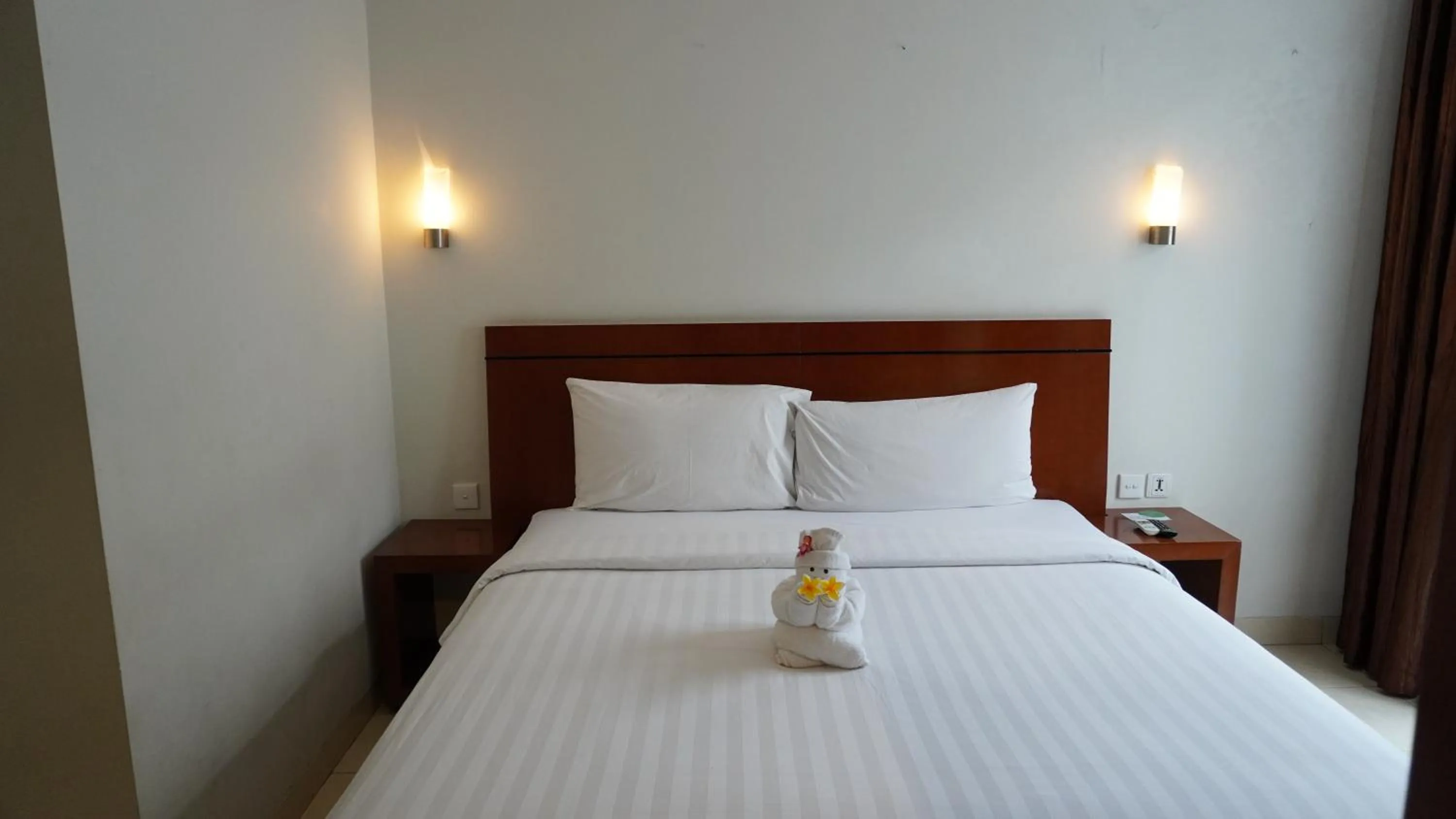 Property building, Bed in Grand Kuta Hotel and Residence