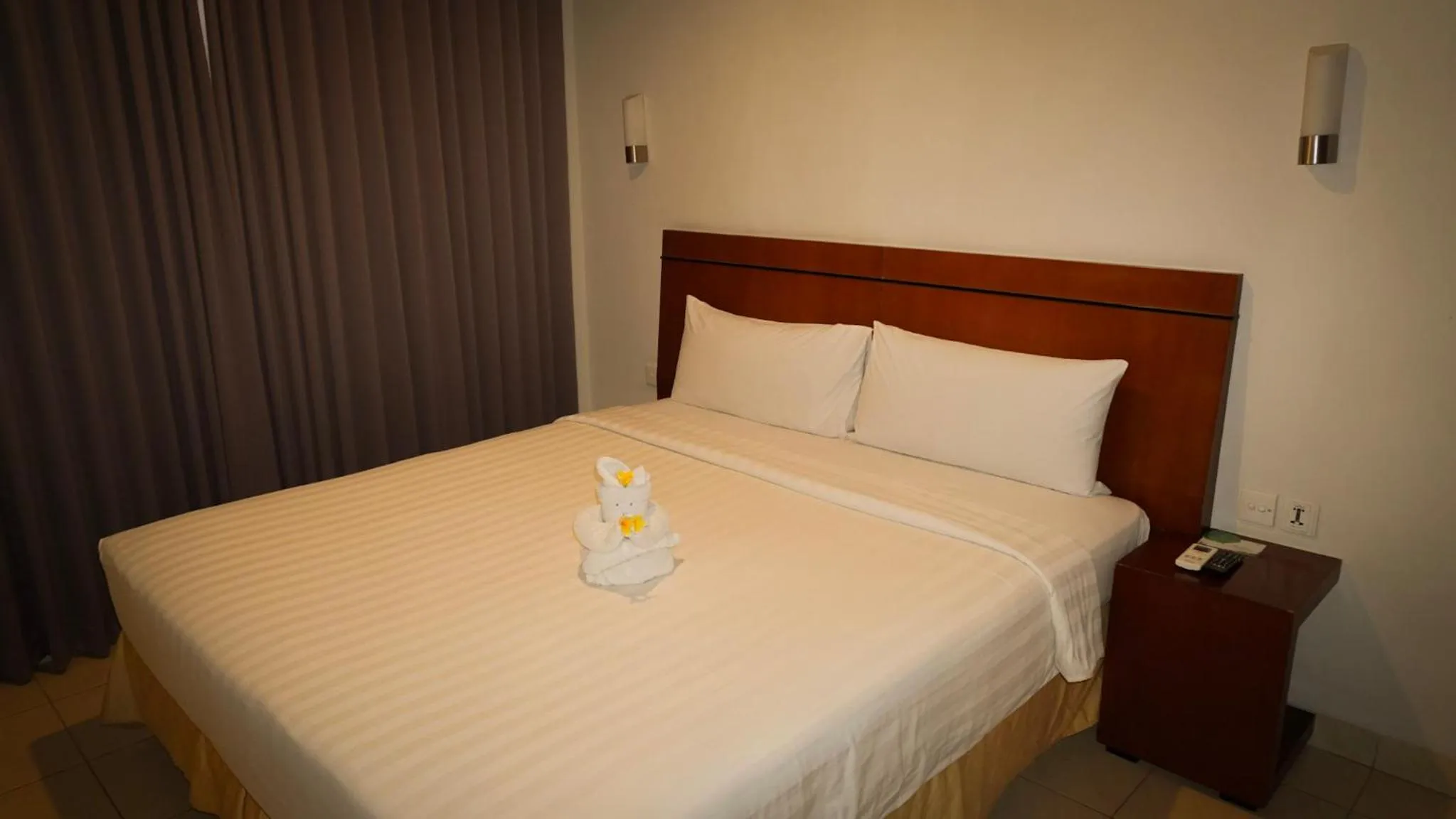 Property building, Bed in Grand Kuta Hotel and Residence