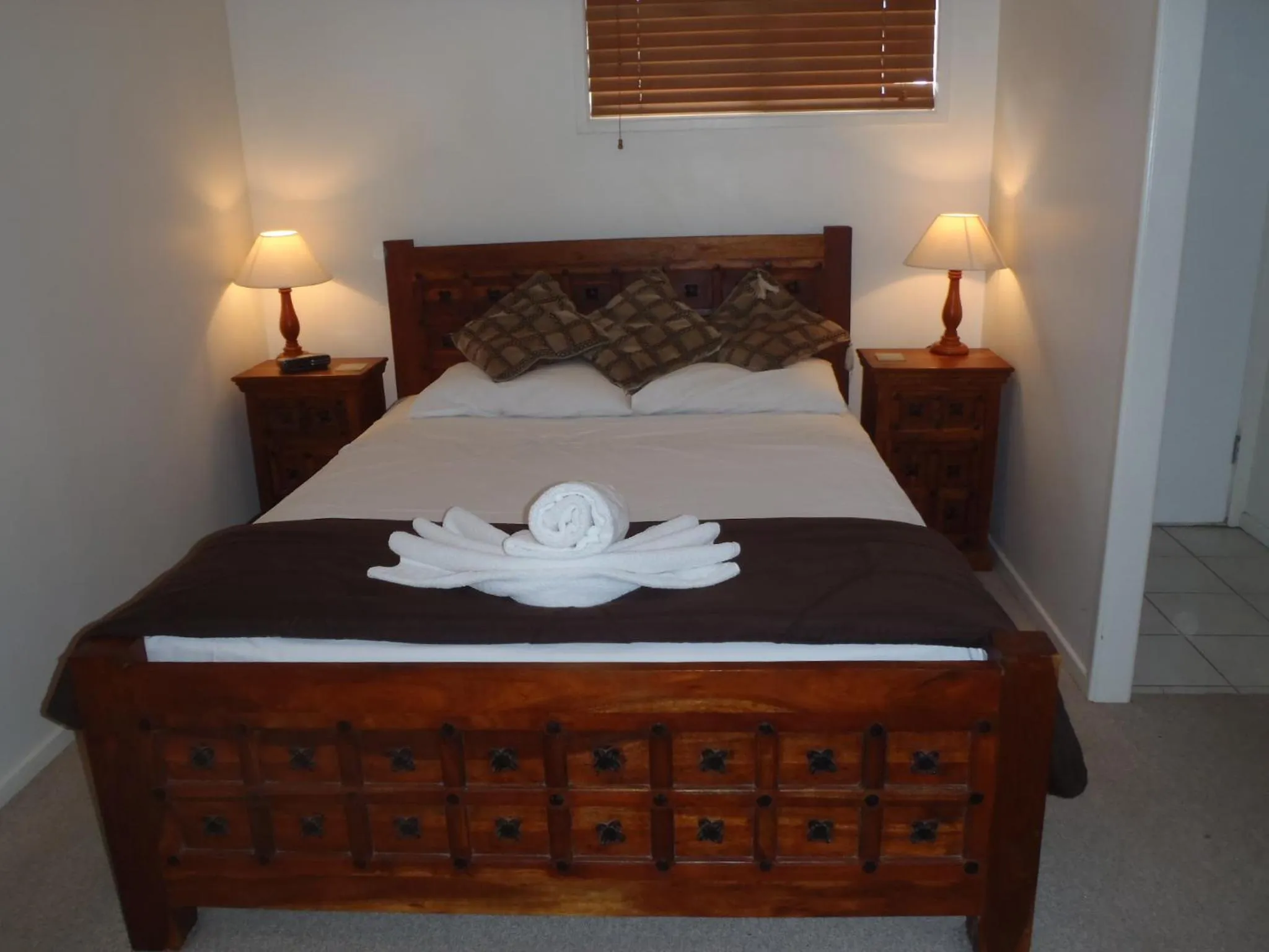 Bed in Beachside Holiday Units