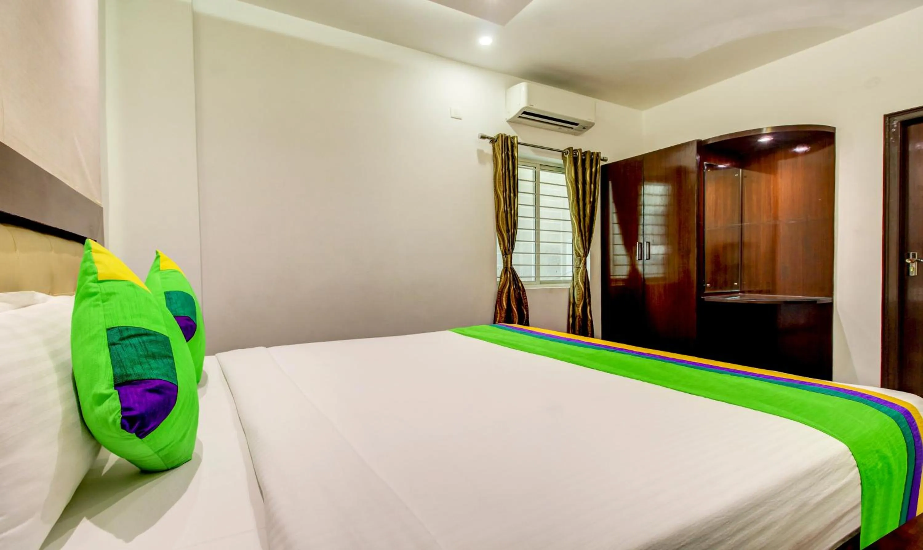 Bedroom, Bed in Treebo The Sai Leela Suites