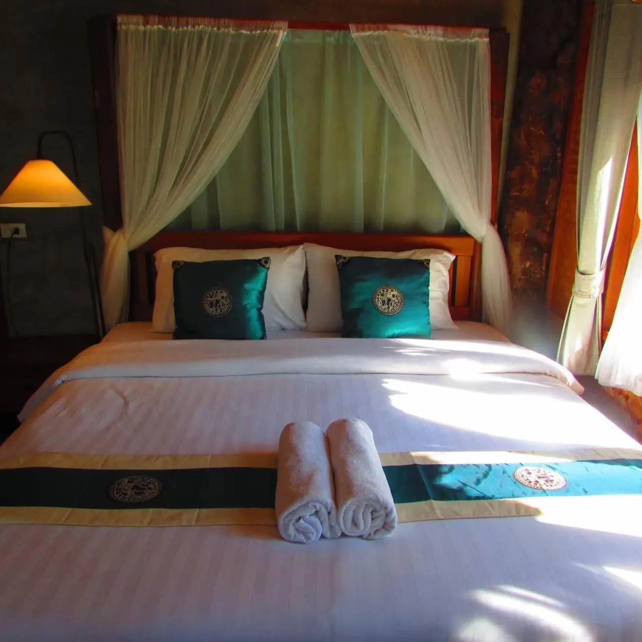Bed in Vimarnkiri Resort