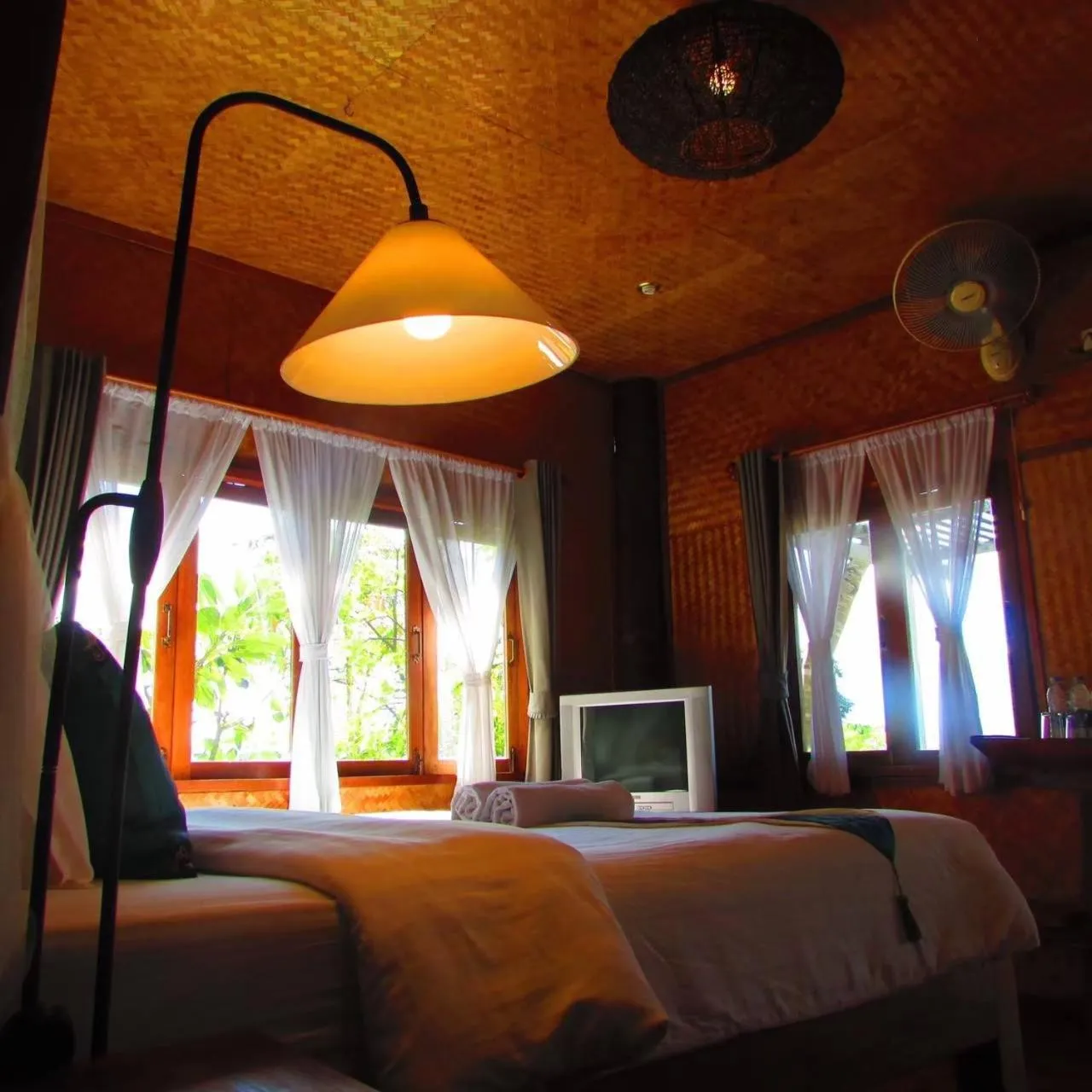 Bed in Vimarnkiri Resort
