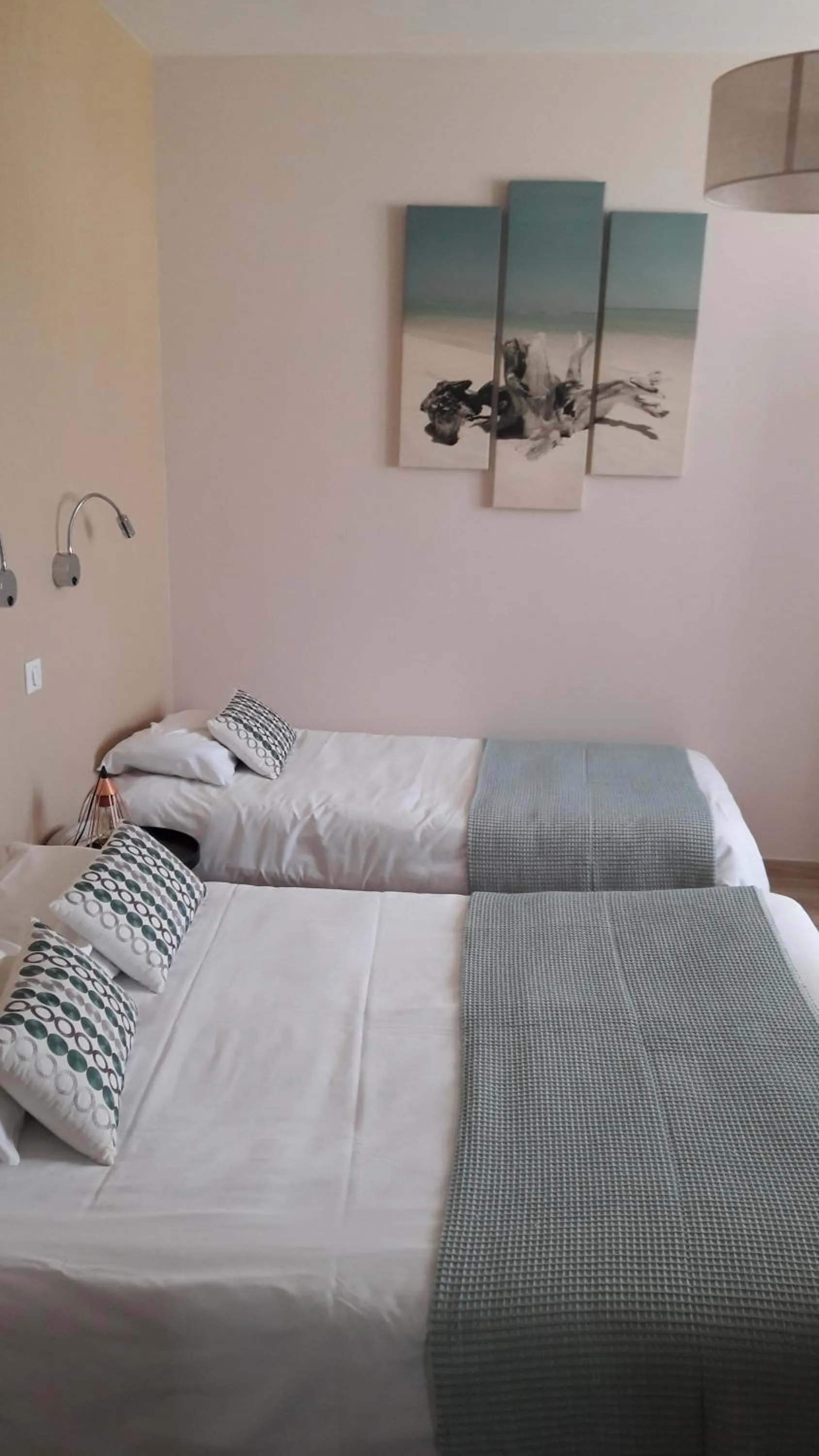 Bed in Logis Hôtel Restaurant L'Oustal