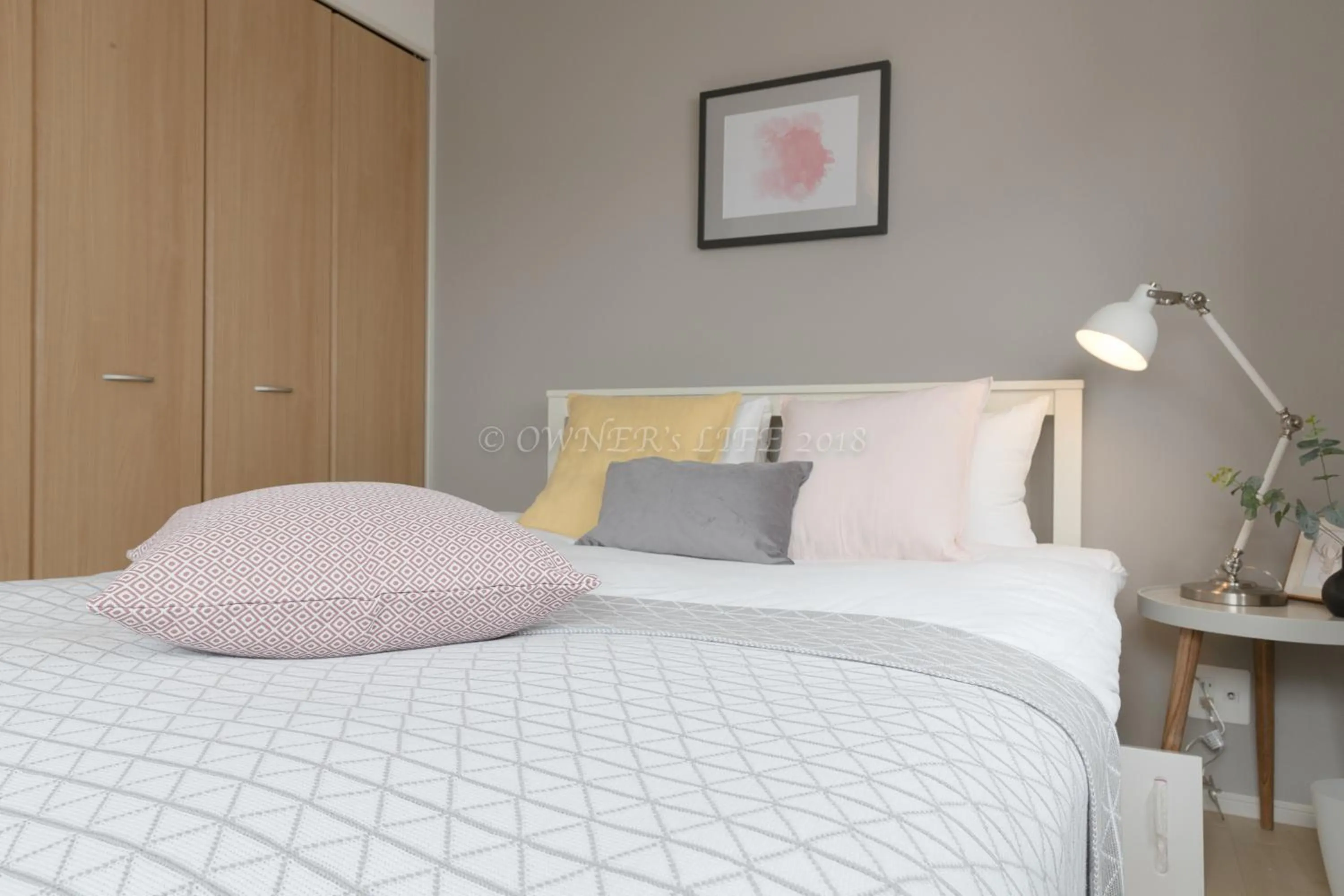 Bed in Condominium Mahalo