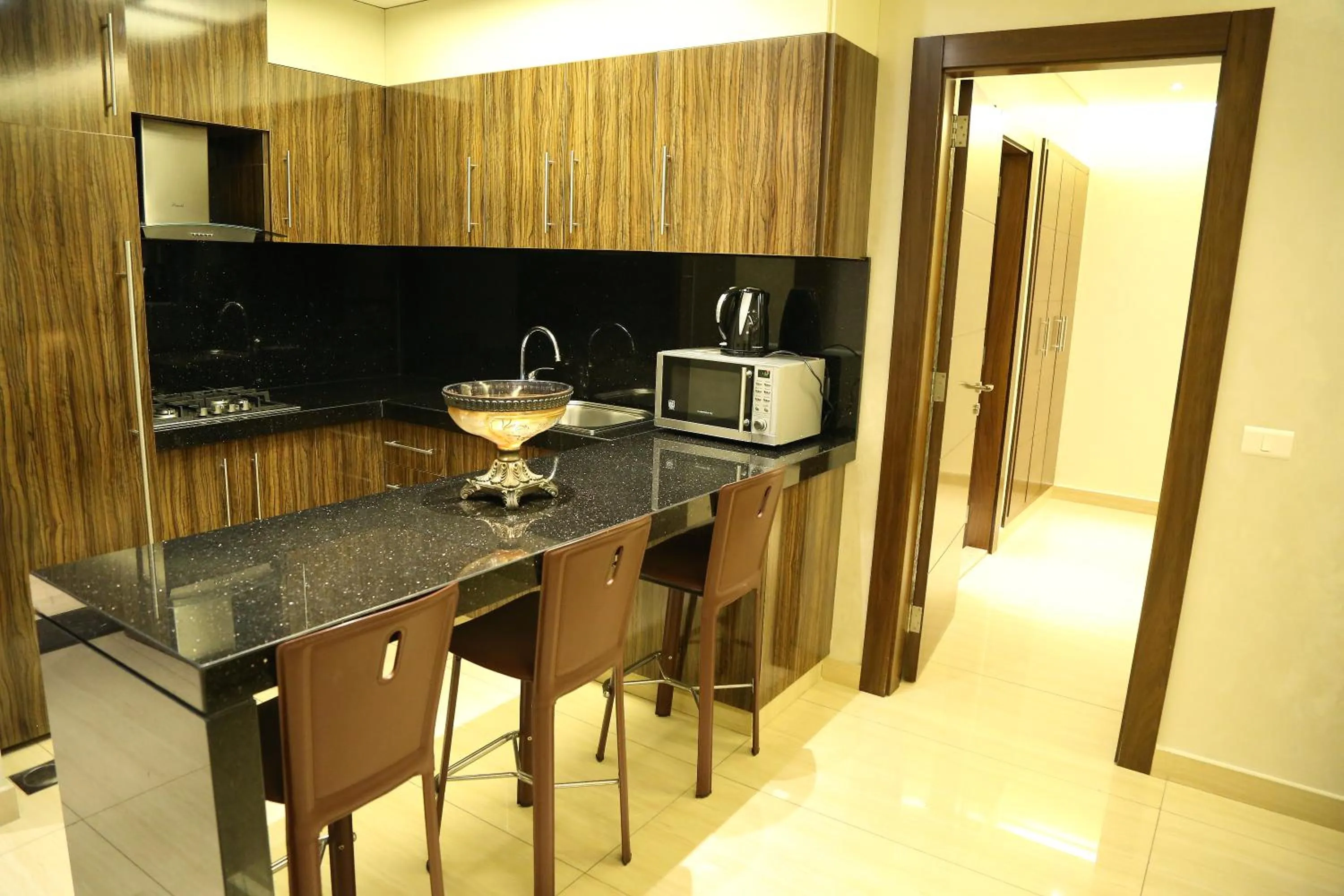 Kitchen or kitchenette in Verdun Suites Hotel