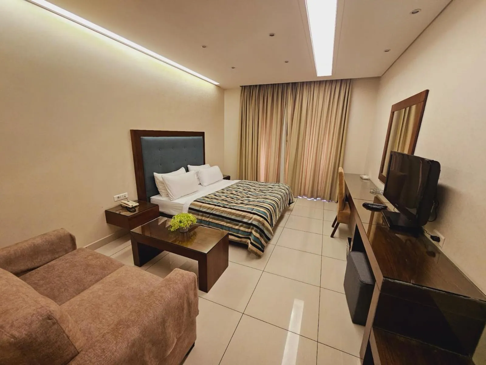 Bed in Verdun Suites Hotel