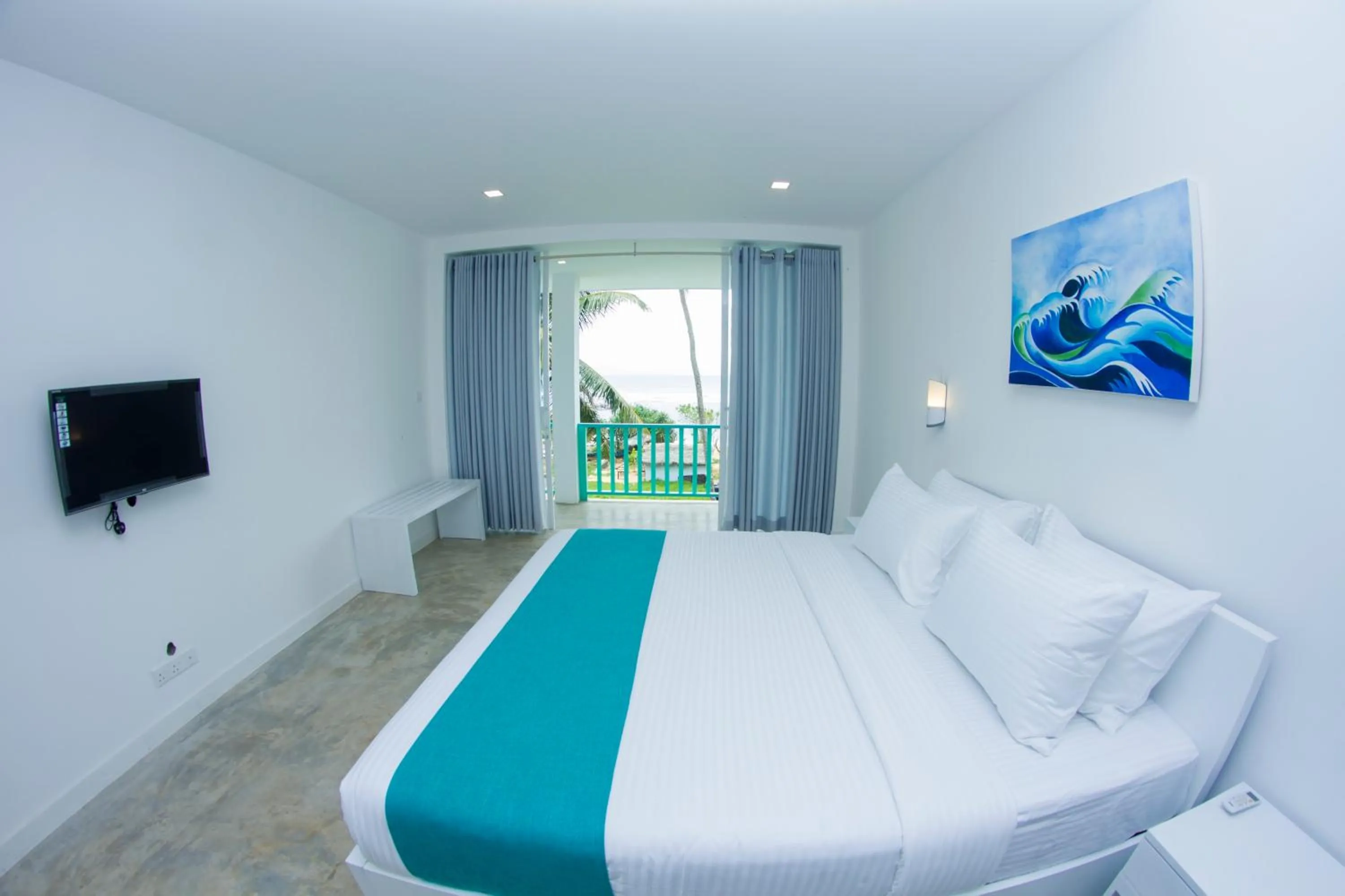 Communal lounge/ TV room, Bed in Somerset Mirissa Beach