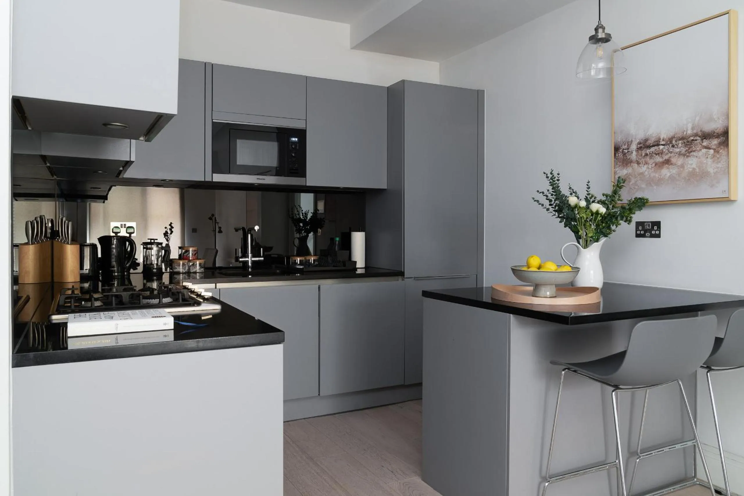 Kitchen or kitchenette in Oxford Circus Apartments by Calton Living