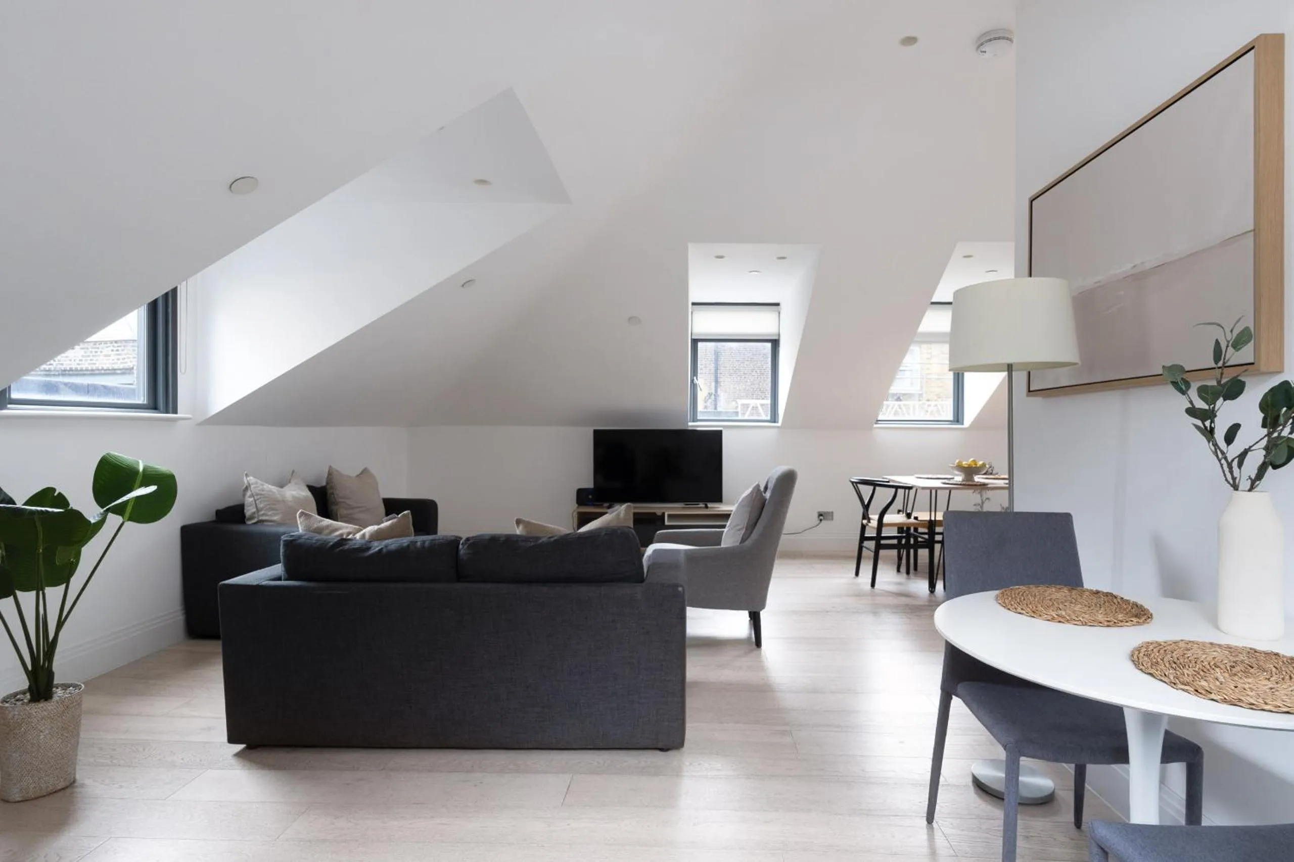 Living room in Oxford Circus Apartments by Calton Living