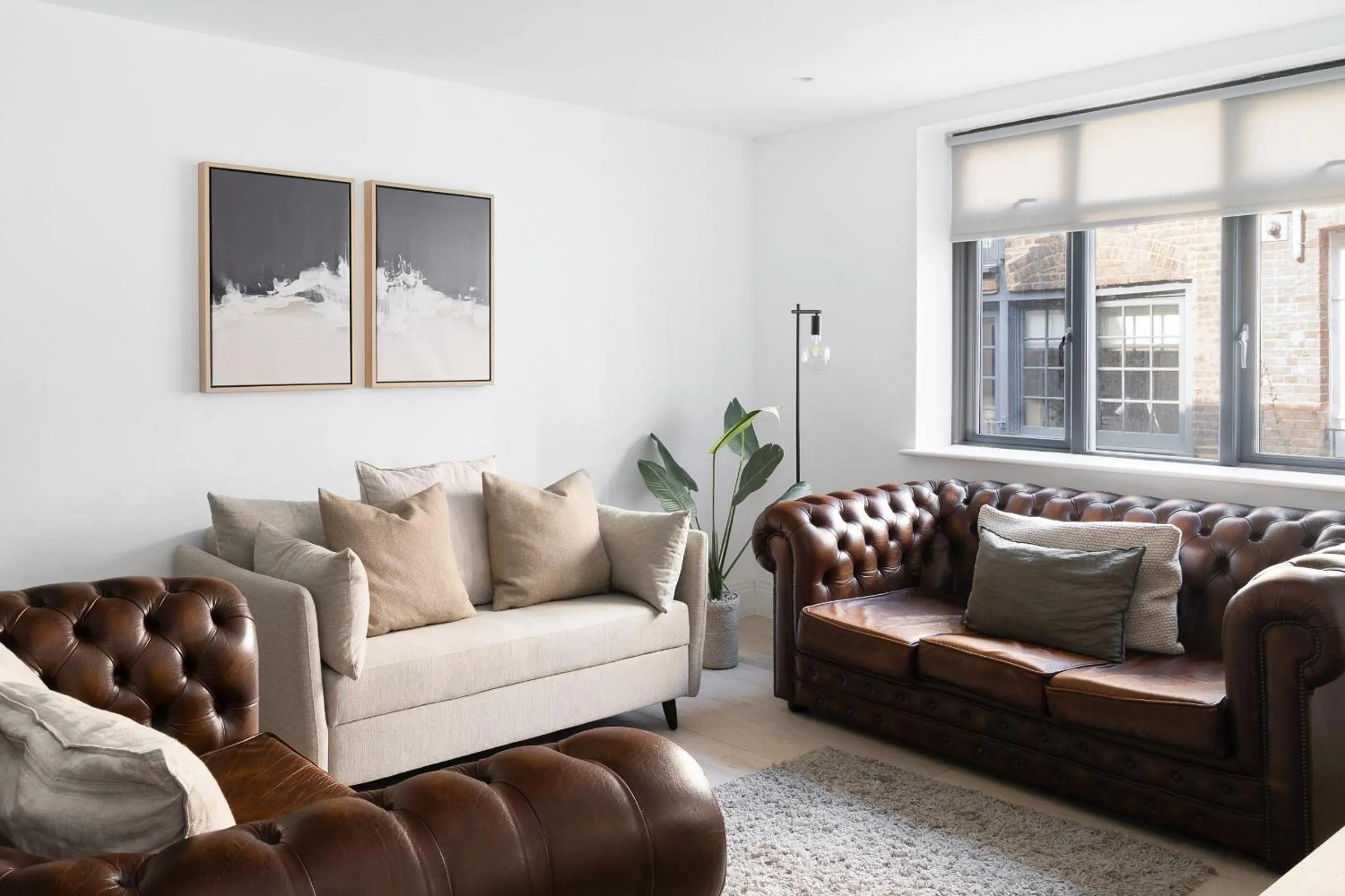 Living room in Oxford Circus Apartments by Calton Living
