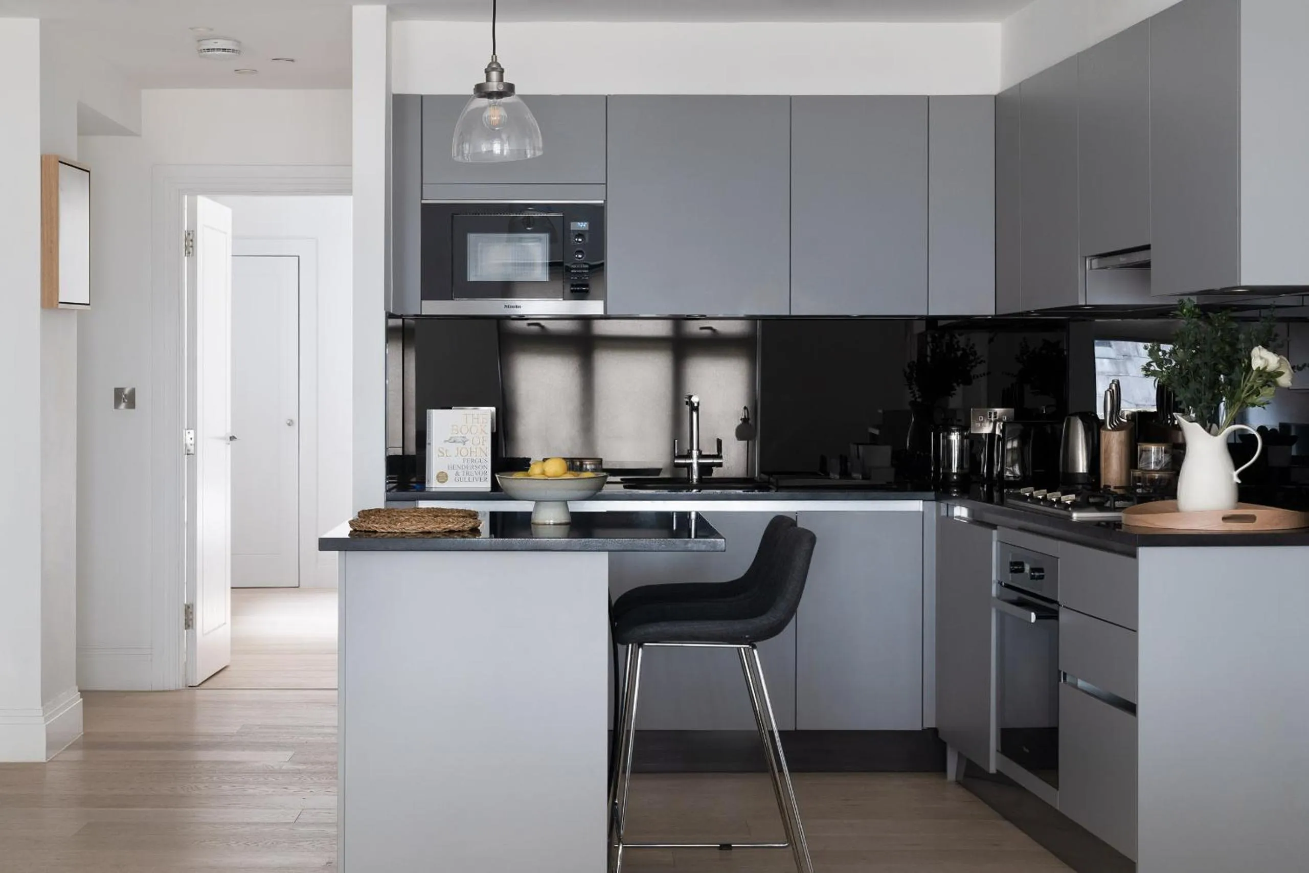 Kitchen or kitchenette in Oxford Circus Apartments by Calton Living