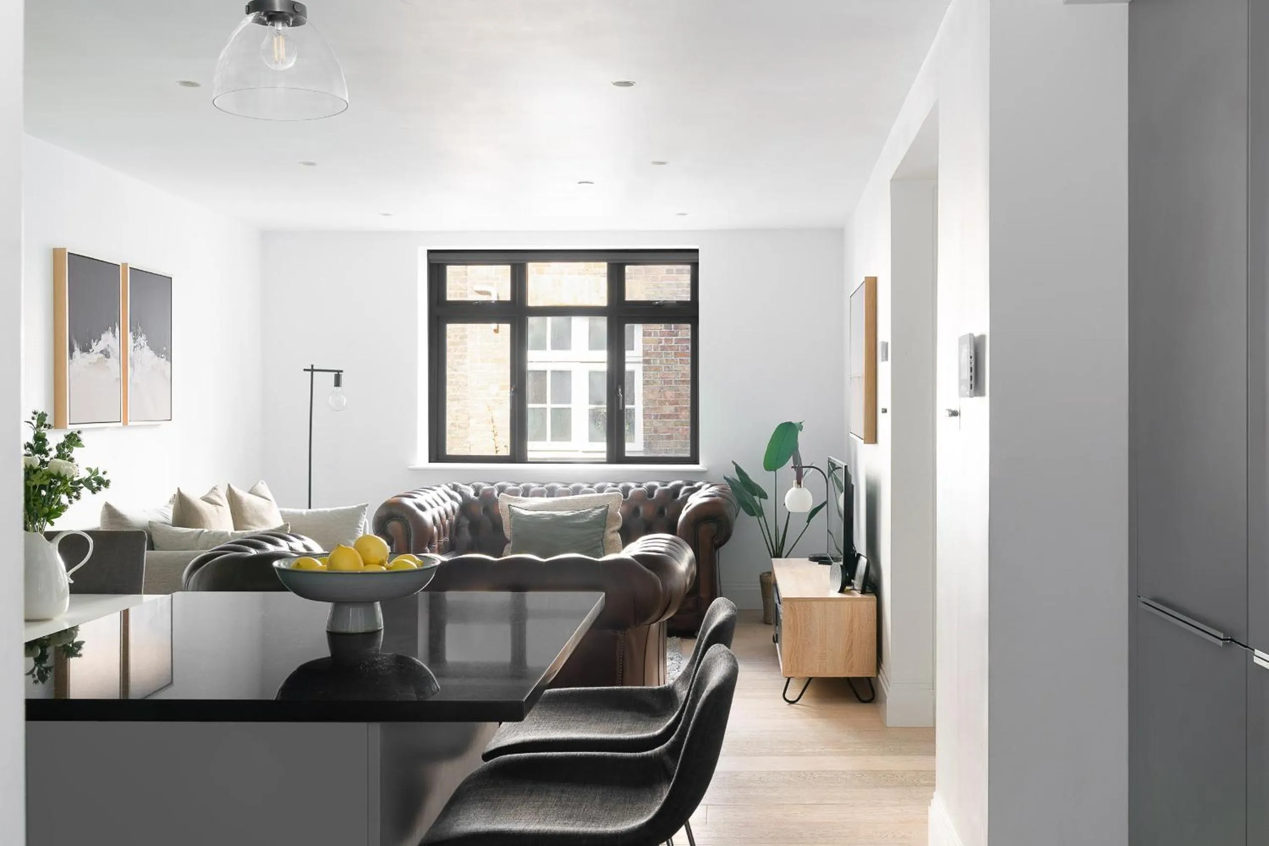 Living room in Oxford Circus Apartments by Calton Living