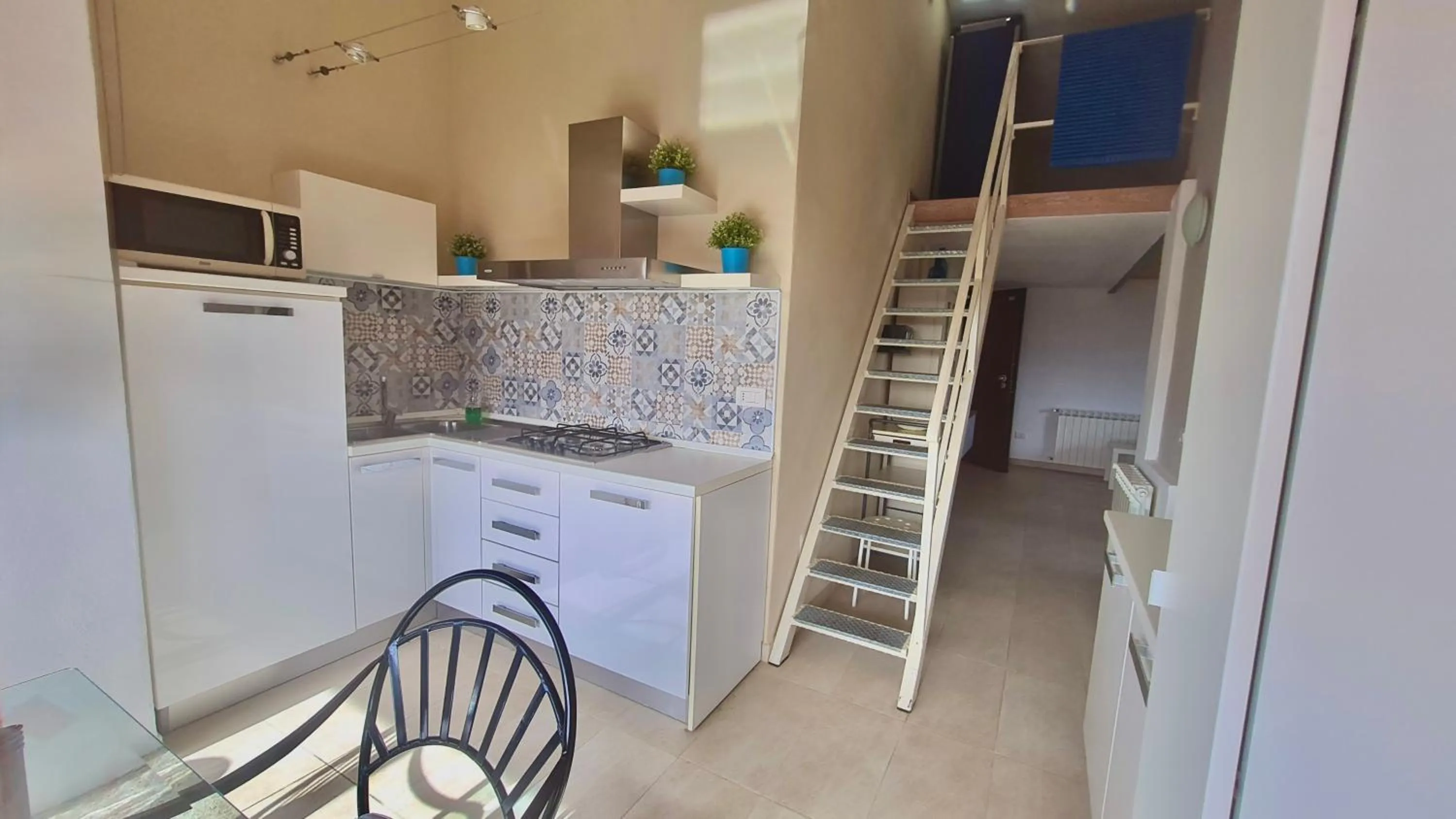 Kitchen or kitchenette in Residence Borgo Punta Villa