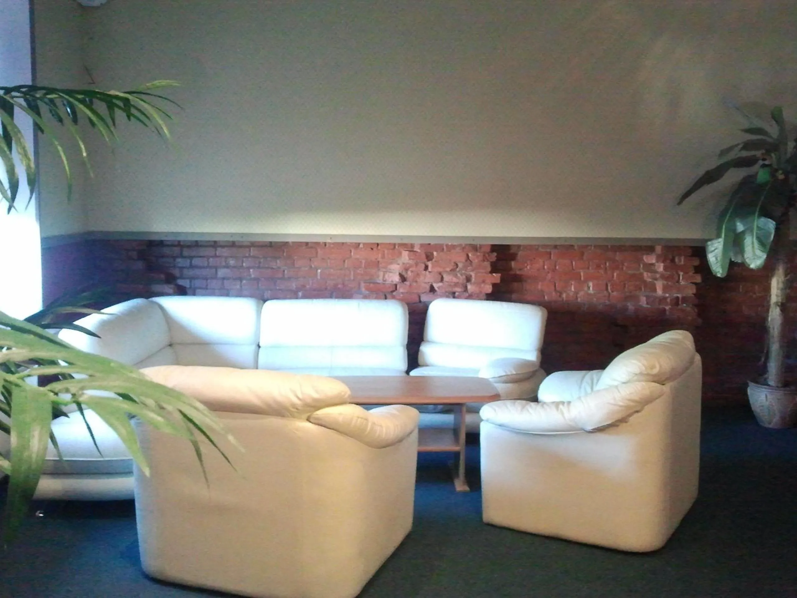 Communal lounge/ TV room in Hotel Erfolg