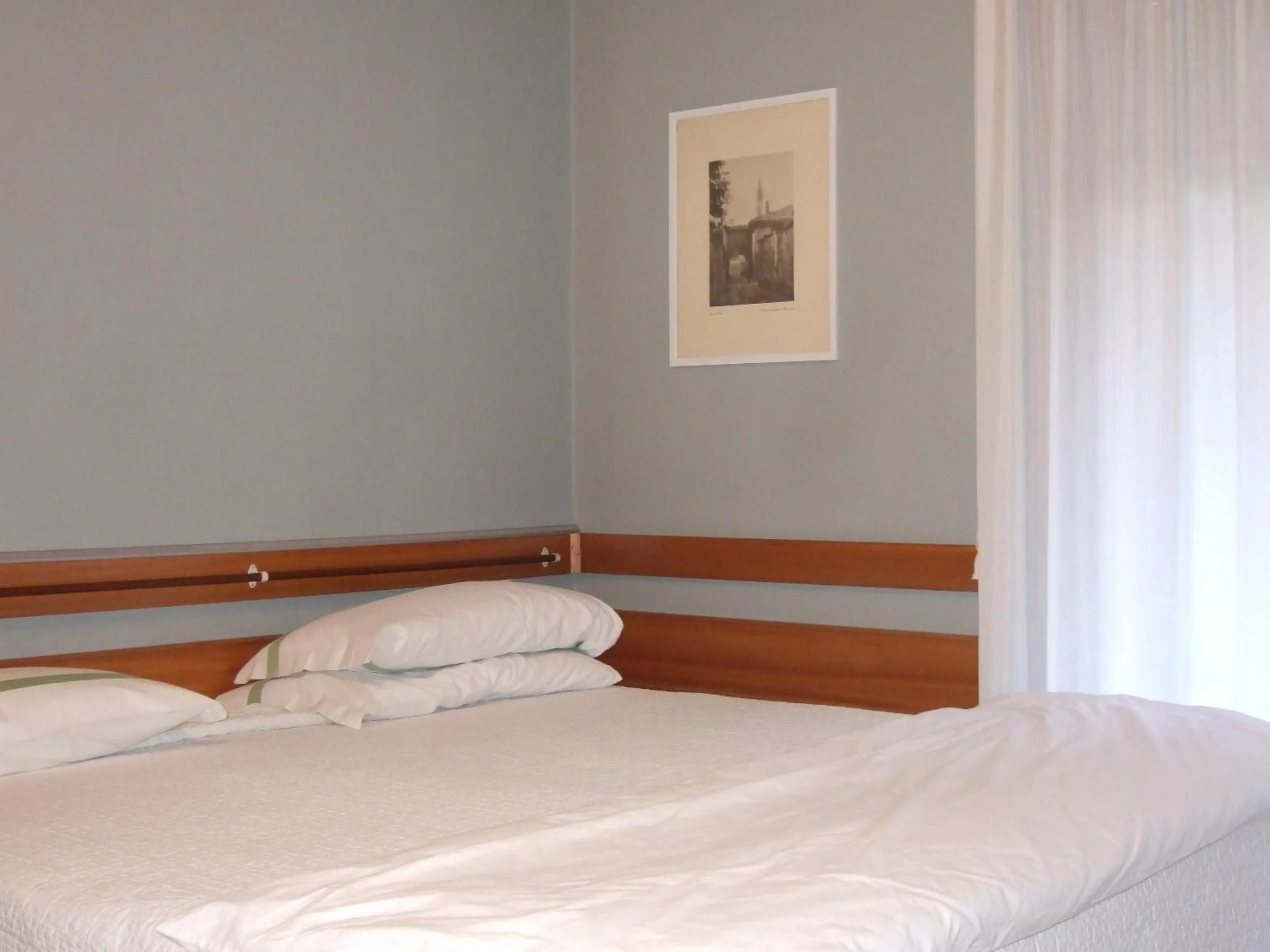 Bed in Hotel Canturio