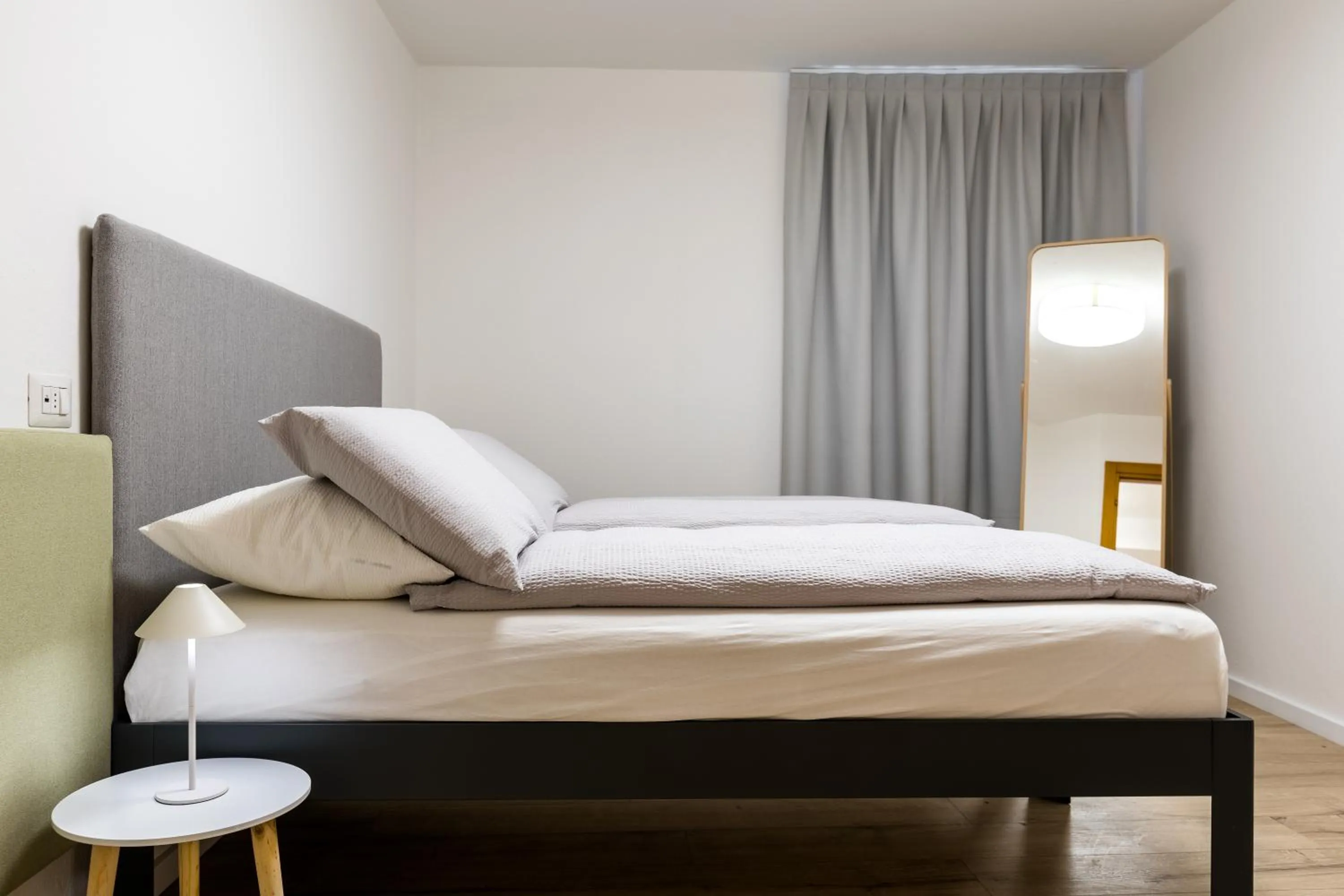 Bed in MAMA Apartments